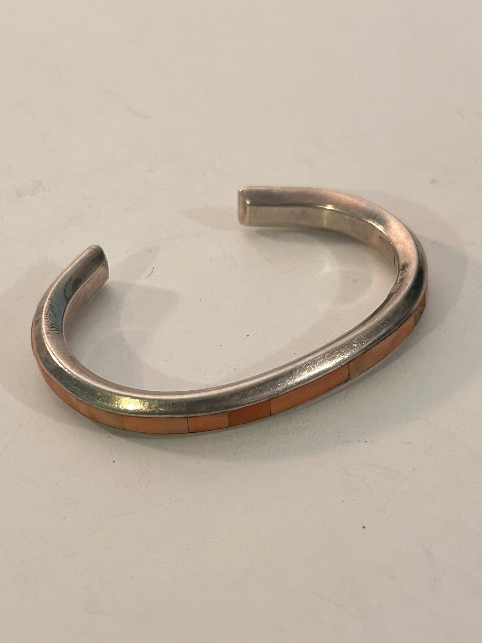 T. Natachu Sterling Silver Navajo Coral Inlay Cuff Bracelet 6" 35 grams missing a small piece of: T. Natachu Sterling Silver Navajo Coral Inlay Cuff Bracelet 6" 35 grams missing a small piece of coral Please view all photos as they are part of the description and condition of this Item, Feel free 