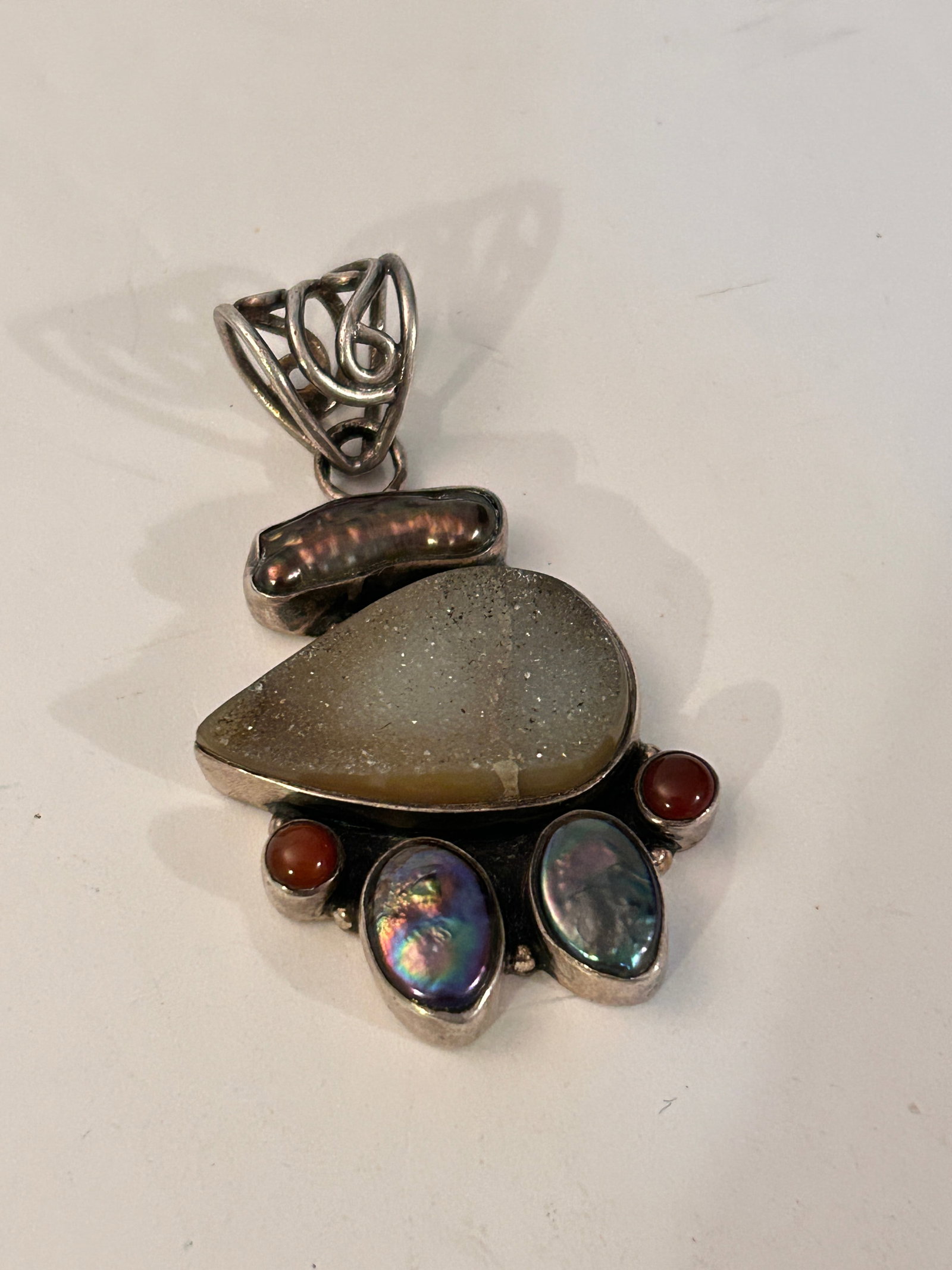 Sterling Silver 925 Genuine Druzy Gemstone Pendant: Sterling Silver 925 Genuine Druzy Gemstone Pendant Please view all photos as they are part of the description and condition of this Item, Feel free to contact me with questions or picture requests! Us