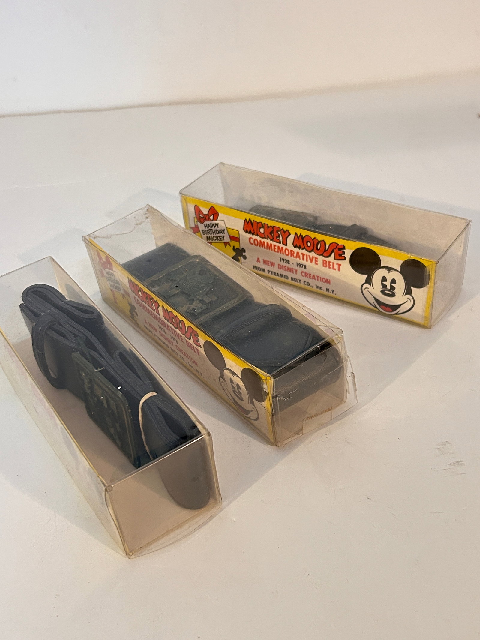 Lot of 3 Vintage Mickey Mouse Commemorative Belts: Lot of 3 Vintage Mickey Mouse Commemorative Belts Please view all photos as they are part of the description and condition of this Item, Feel free to contact me with questions or picture requests! Use