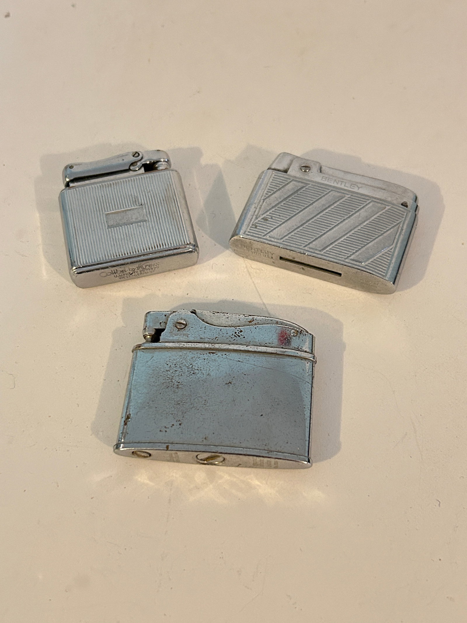 Vintage lot of 3 Lighters: Vintage lot of 3 Lighters Please view all photos as they are part of the description and condition of this Item, Feel free to contact me with questions or picture requests! Used Item AS IS
