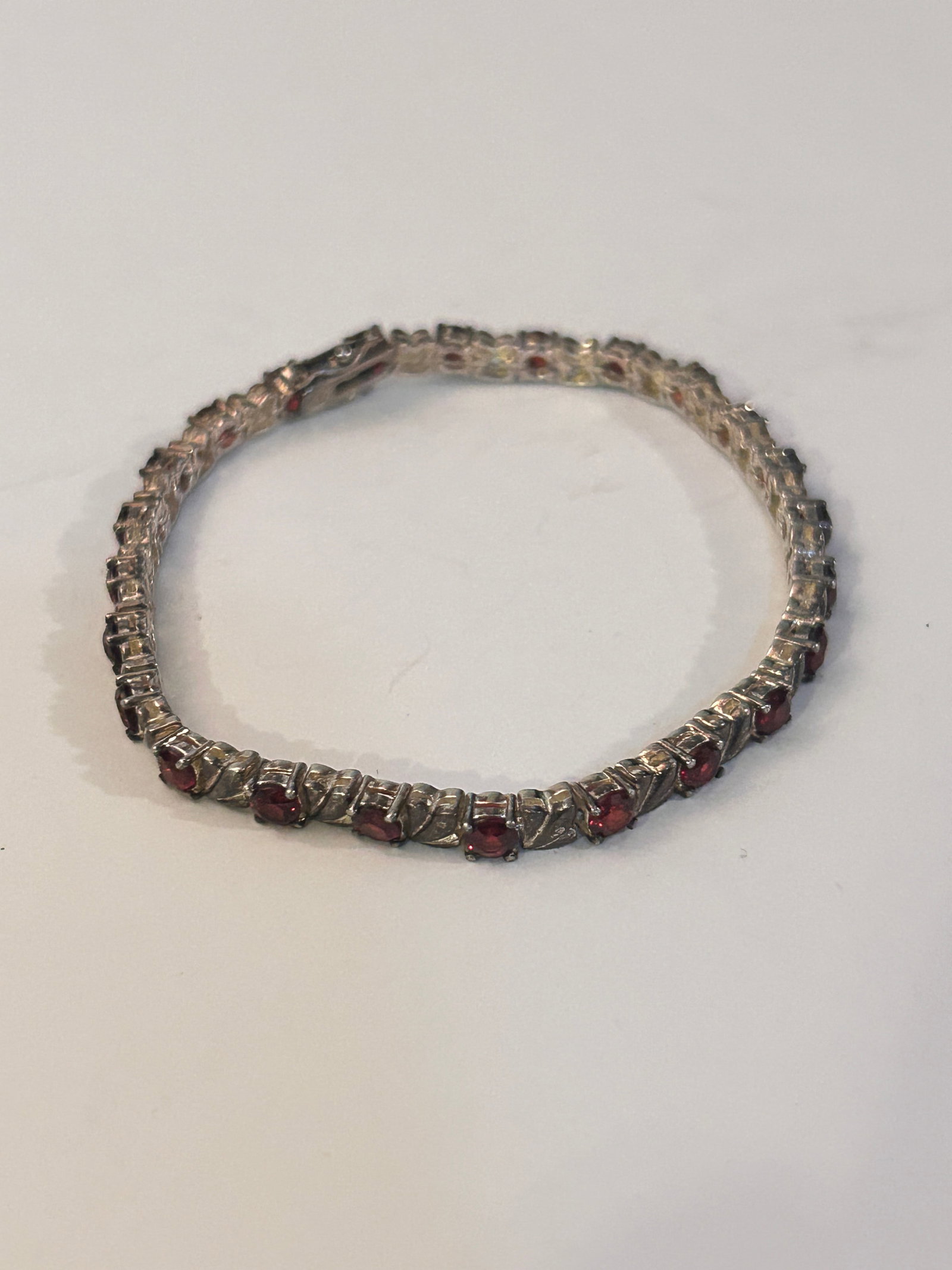 Vintage Sterling Silver red Rhinestone Bracelet Sz 8": Vintage Sterling Silver red Rhinestone Bracelet Sz 8" Please view all photos as they are part of the description and condition of this Item, Feel free to contact me with questions or picture requests!