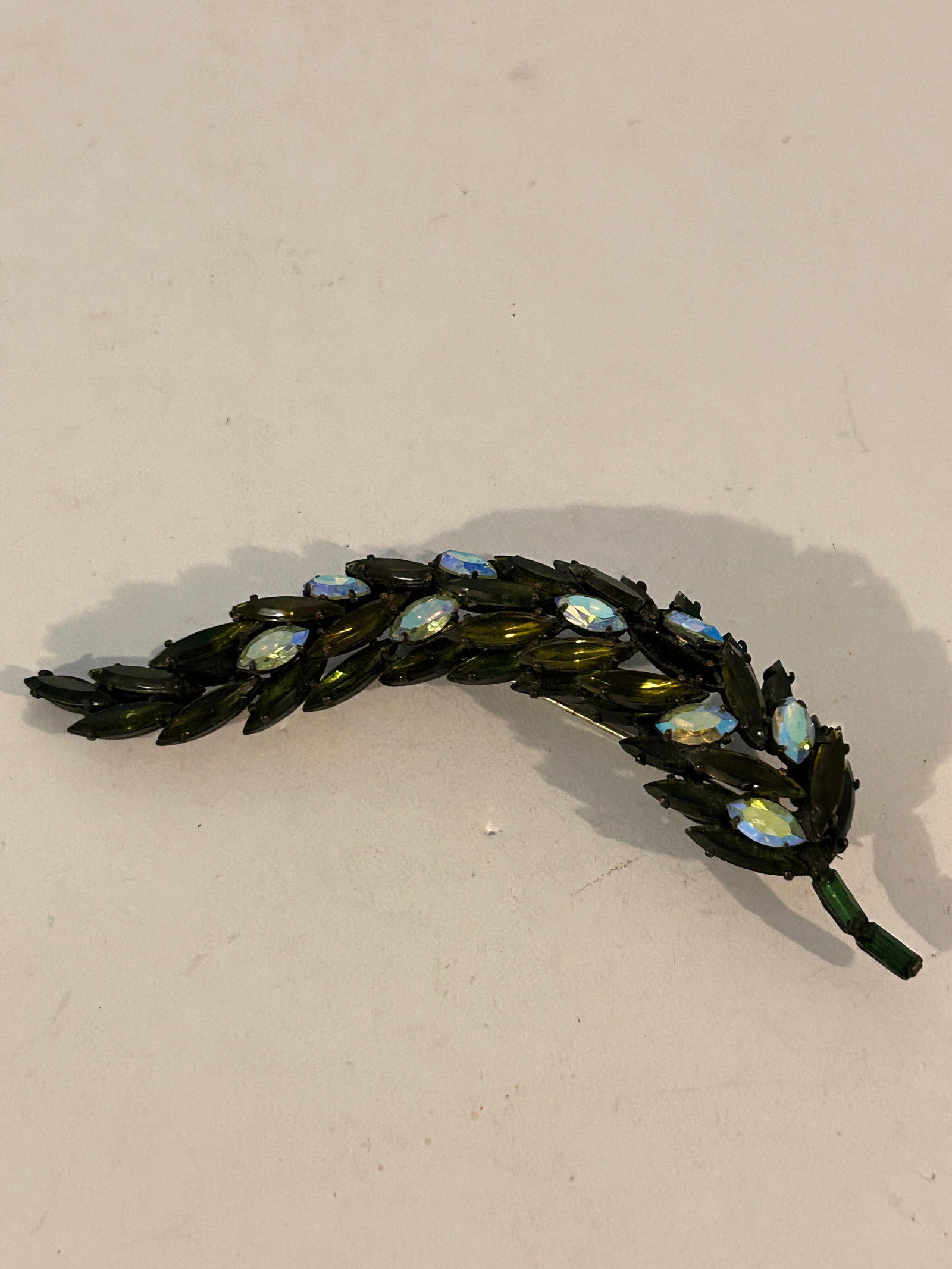 Vintage Regency Jewels Rhinestones Pin Brooch Leaf Signed 4 3/4": Vintage Regency Jewels Rhinestones Pin Brooch Leaf Signed 4 3/4" Please view all photos as they are part of the description and condition of this Item, Feel free to contact me with questions or pictur