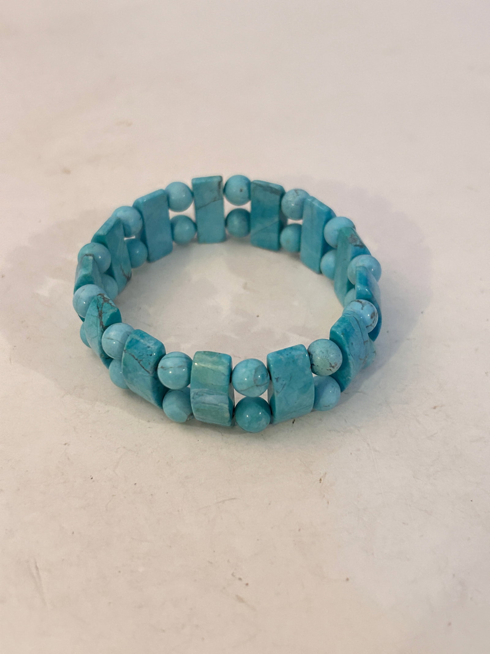 Vintage Turquoise beaded stretch Bracelet: Vintage Turquoise beaded stretch Bracelet Please view all photos as they are part of the description and condition of this Item, Feel free to contact me with questions or picture requests! Used Item A