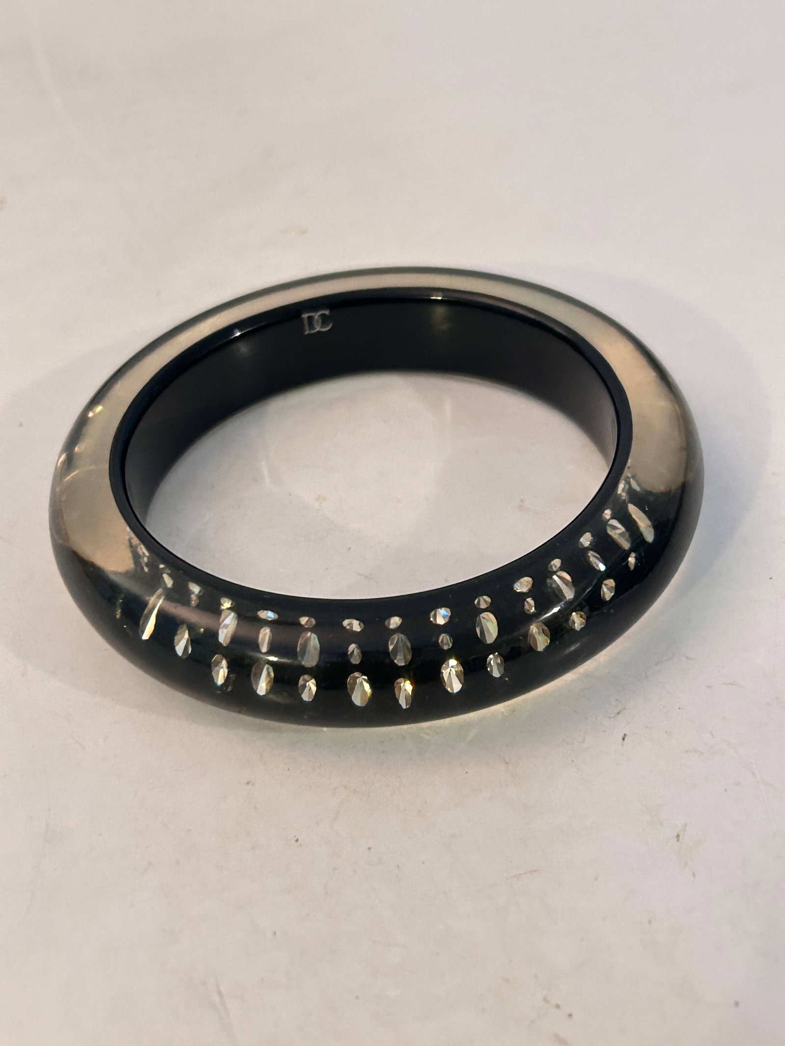 Vintage Clear Acrylic DC Bracelet 7": Vintage Clear Acrylic DC Bracelet 7" Please view all photos as they are part of the description and condition of this Item, Feel free to contact me with questions or picture requests! Used Item AS IS