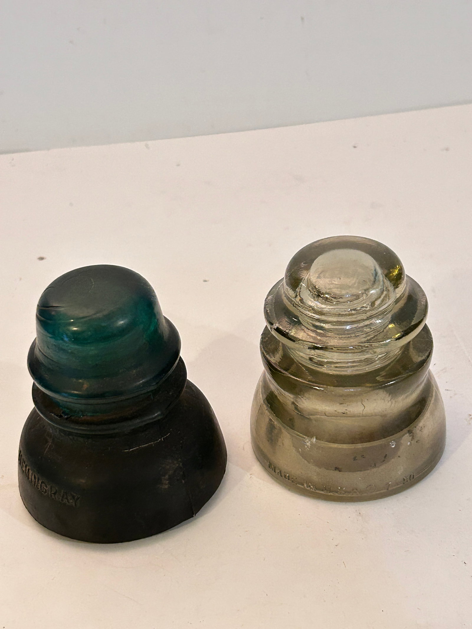 Two Vintage Glass Insulators: Two Vintage Glass Insulators Please view all photos as they are part of the description and condition of this Item, Feel free to contact me with questions or picture requests! Used Item AS IS