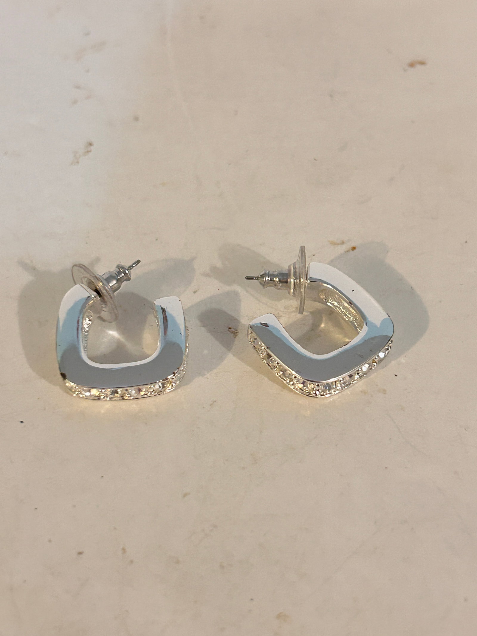 Vintage Joan Rivers Rhinestone Earrings: Vintage Joan Rivers Rhinestone EarringsPlease view all photos as they are part of the description and condition of this Item, Feel free to contact me with questions or picture requests! Used Item AS I