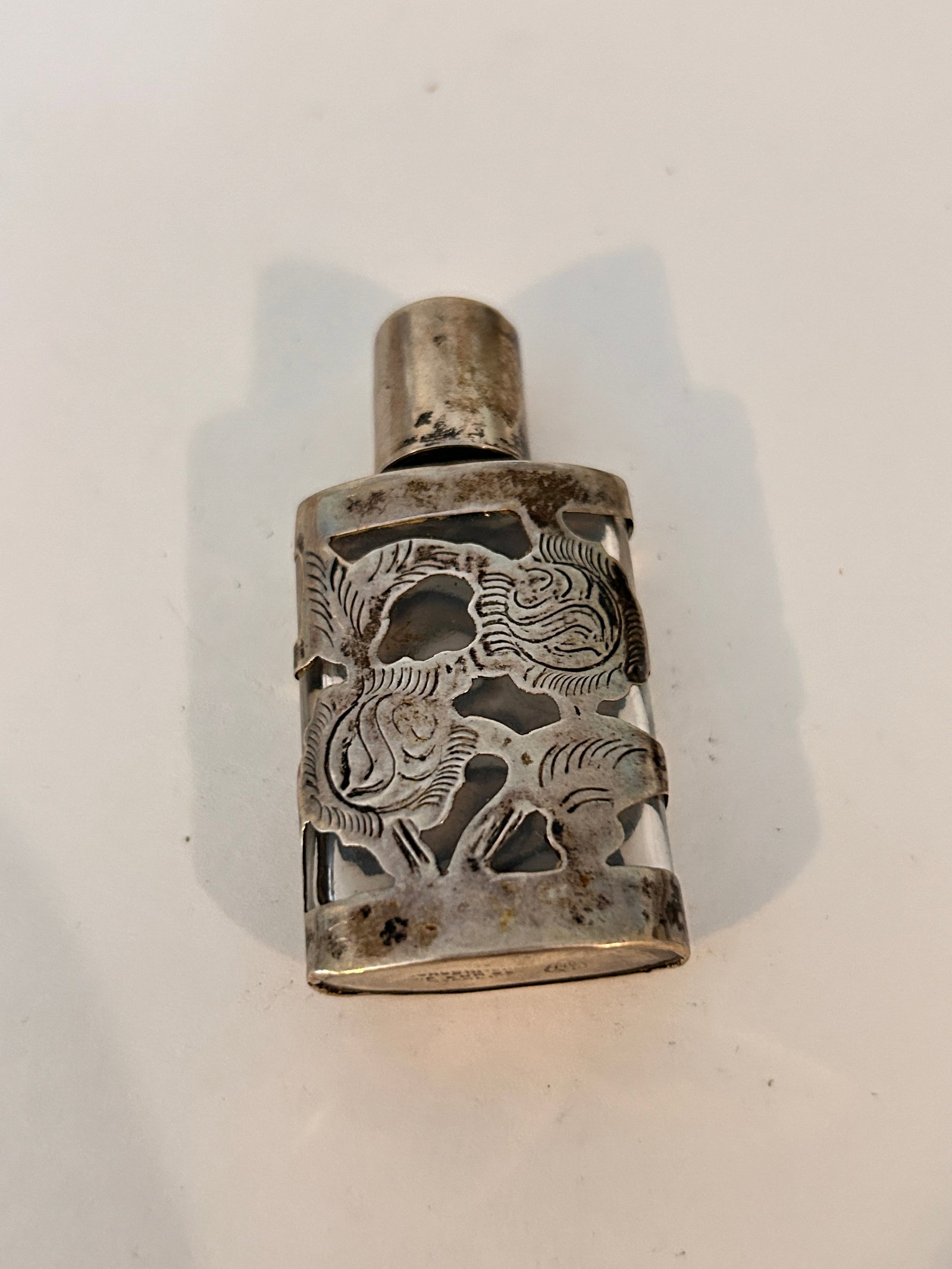 LHM Mexico Sterling Silver Overlay Glass Perfume Bottle with 2 1/4": LHM Mexico Sterling Silver Overlay Glass Perfume Bottle with 2 1/4" Please view all photos as they are part of the description and condition of this Item, Feel free to contact me with questions or pic