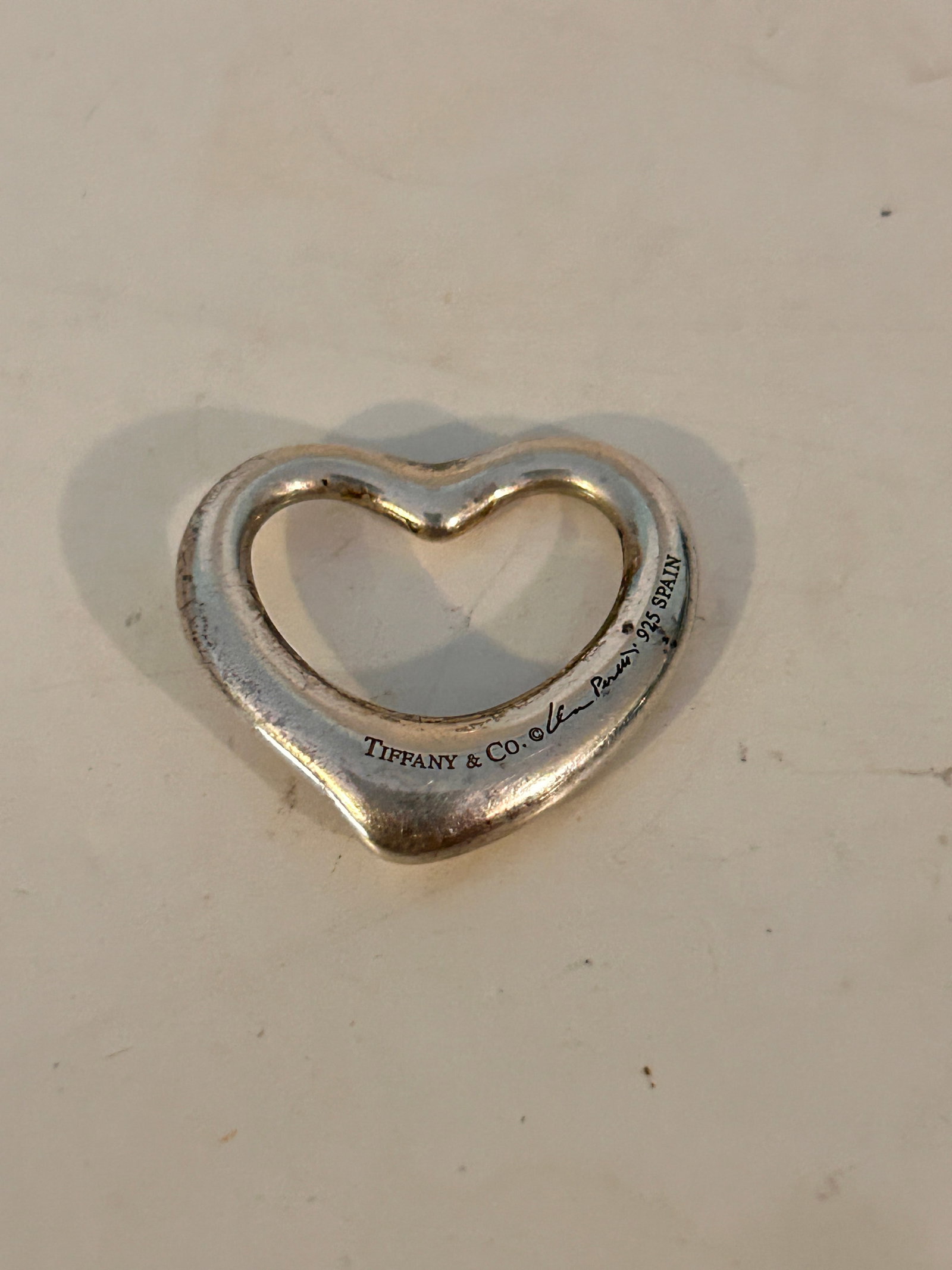 Tiffany & Co. Sterling Silver Elsa Peretti Open Heart Pendant 4 grams: Tiffany & Co. Sterling Silver Elsa Peretti Open Heart Pendant 4 gramsPlease view all photos as they are part of the description and condition of this Item, Feel free to contact me with questions or pi