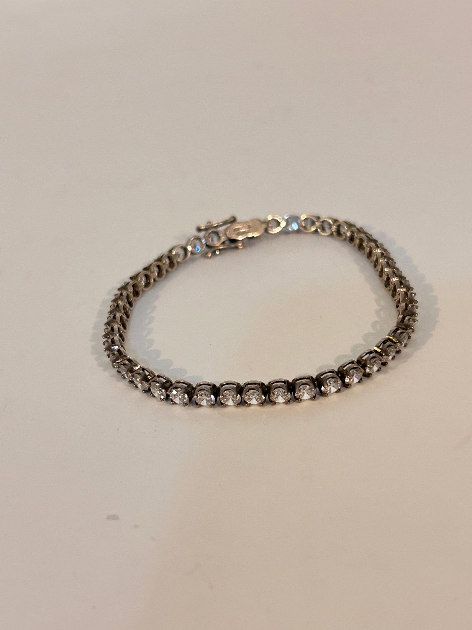 Vintage Sterling Silver Rhinestone Bracelet 8": Vintage Sterling Silver Rhinestone Bracelet 8" Please view all photos as they are part of the description and condition of this Item, Feel free to contact me with questions or picture requests! Used I