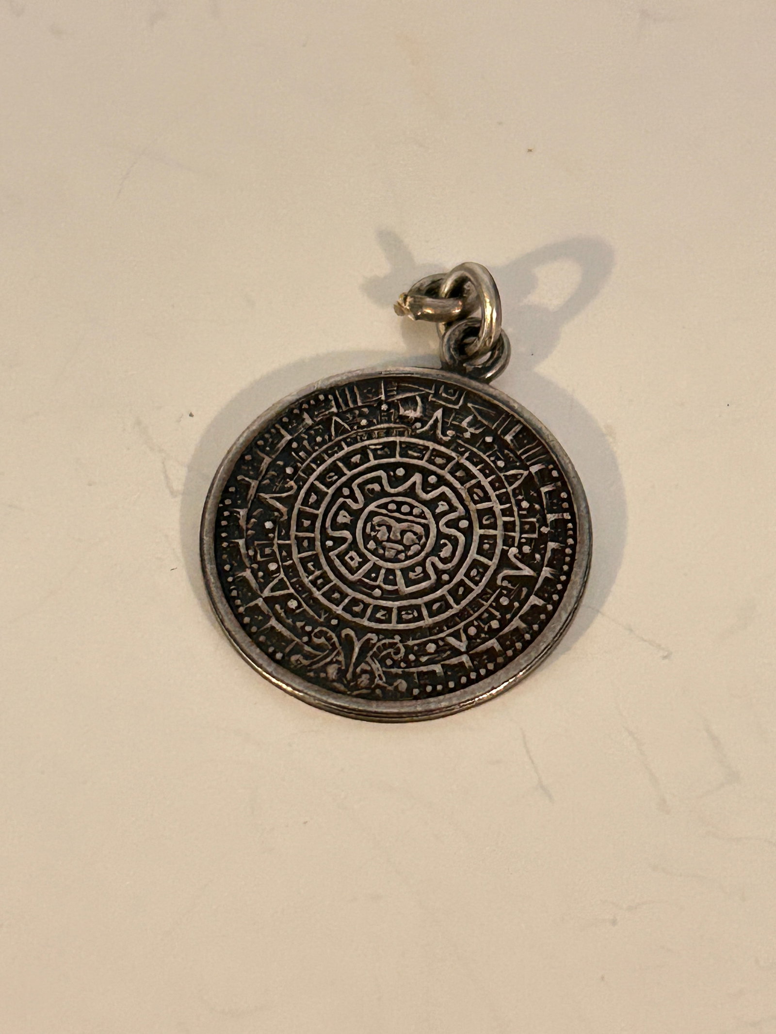 925 Sterling Silver Vintage Mayan Calendar Charm Pendant: 925 Sterling Silver Vintage Mayan Calendar Charm Pendant Please view all photos as they are part of the description and condition of this Item, Feel free to contact me with questions or picture reques