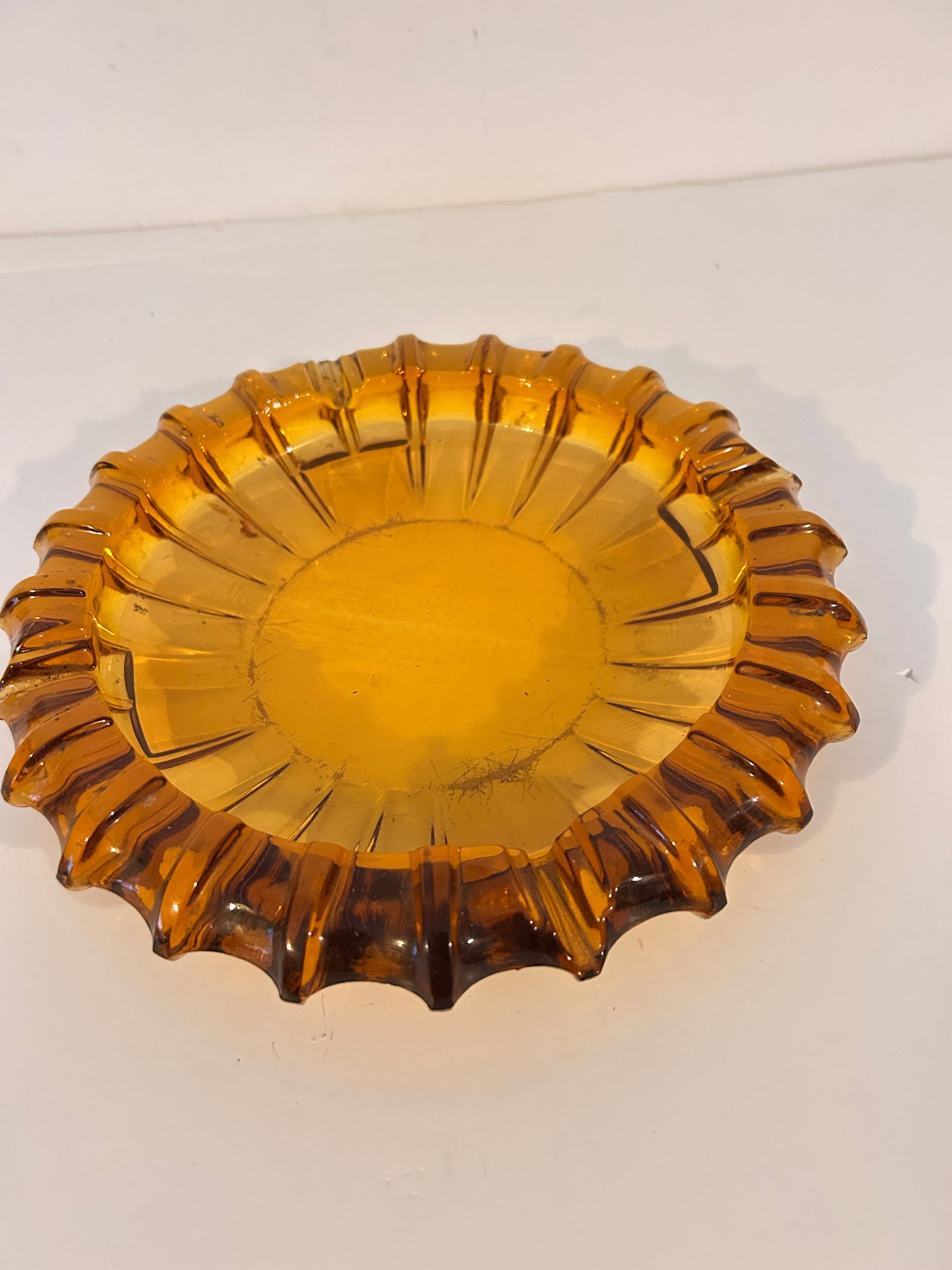 Vintage Sunburst Amber Honey Gold Glass Lg 10 Inch Ashtray or Trinket Dish: Vintage Sunburst Amber Honey Gold Glass Lg 10 Inch Ashtray or Trinket Dish Please view all photos as they are part of the description and condition of this Item, Feel free to contact me with questions