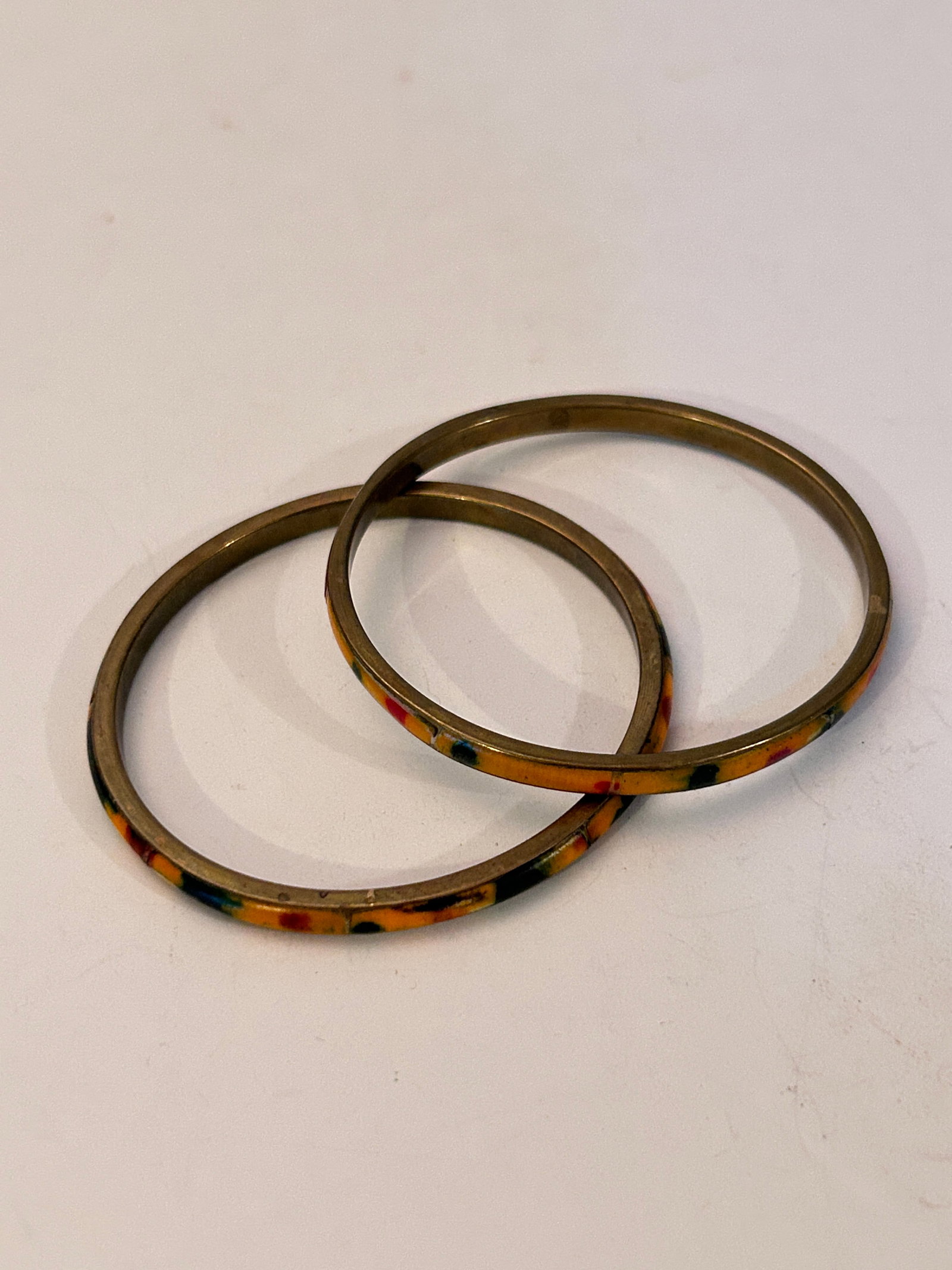 2 Brass Yellow Red Green Bangle Bracelets: 2 Brass Yellow Red Green Bangle Bracelets Please view all photos as they are part of the description and condition of this Item, Feel free to contact me with questions or picture requests! Used Item A