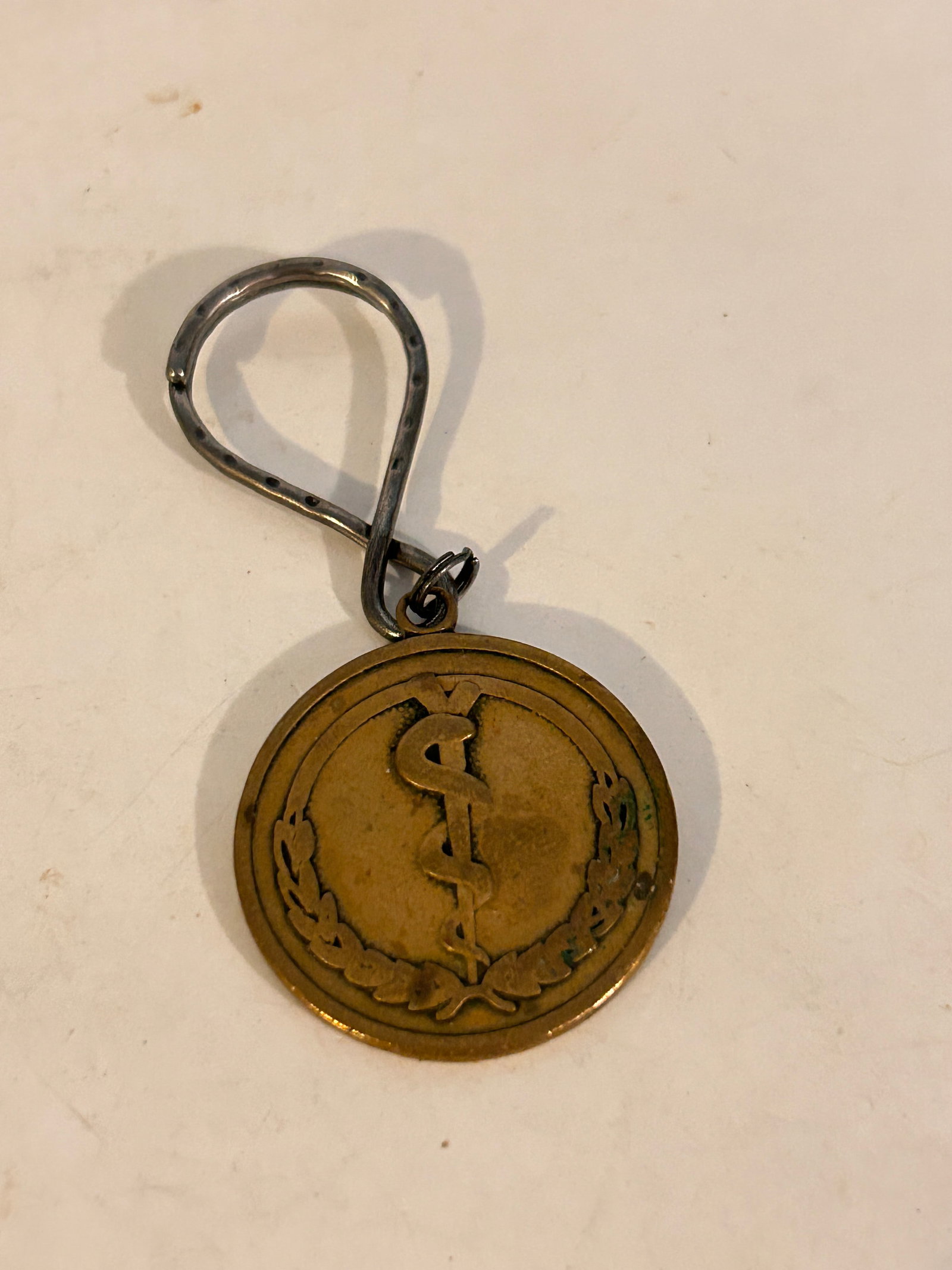 Eli Lilly & CO Indianapolis, Ind. Rod Of Asclepius if found keychain (1 of 4)