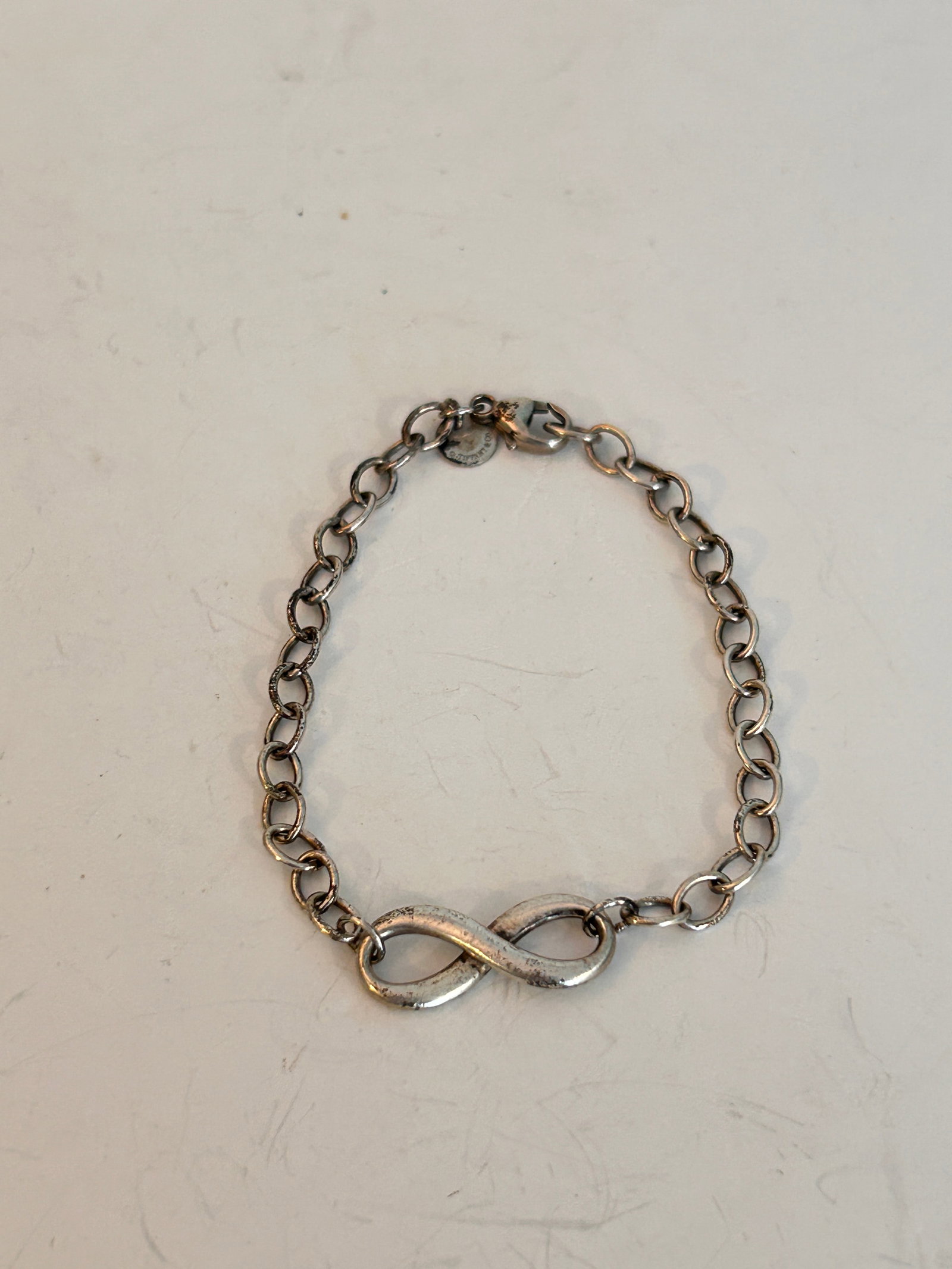 Vintage Tiffany & Co Infinity Bracelet Sterling Silver 7?: Vintage Tiffany & Co Infinity Bracelet Sterling Silver 7? Please view all photos as they are part of the description and condition of this Item, Feel free to contact me with questions or picture reque