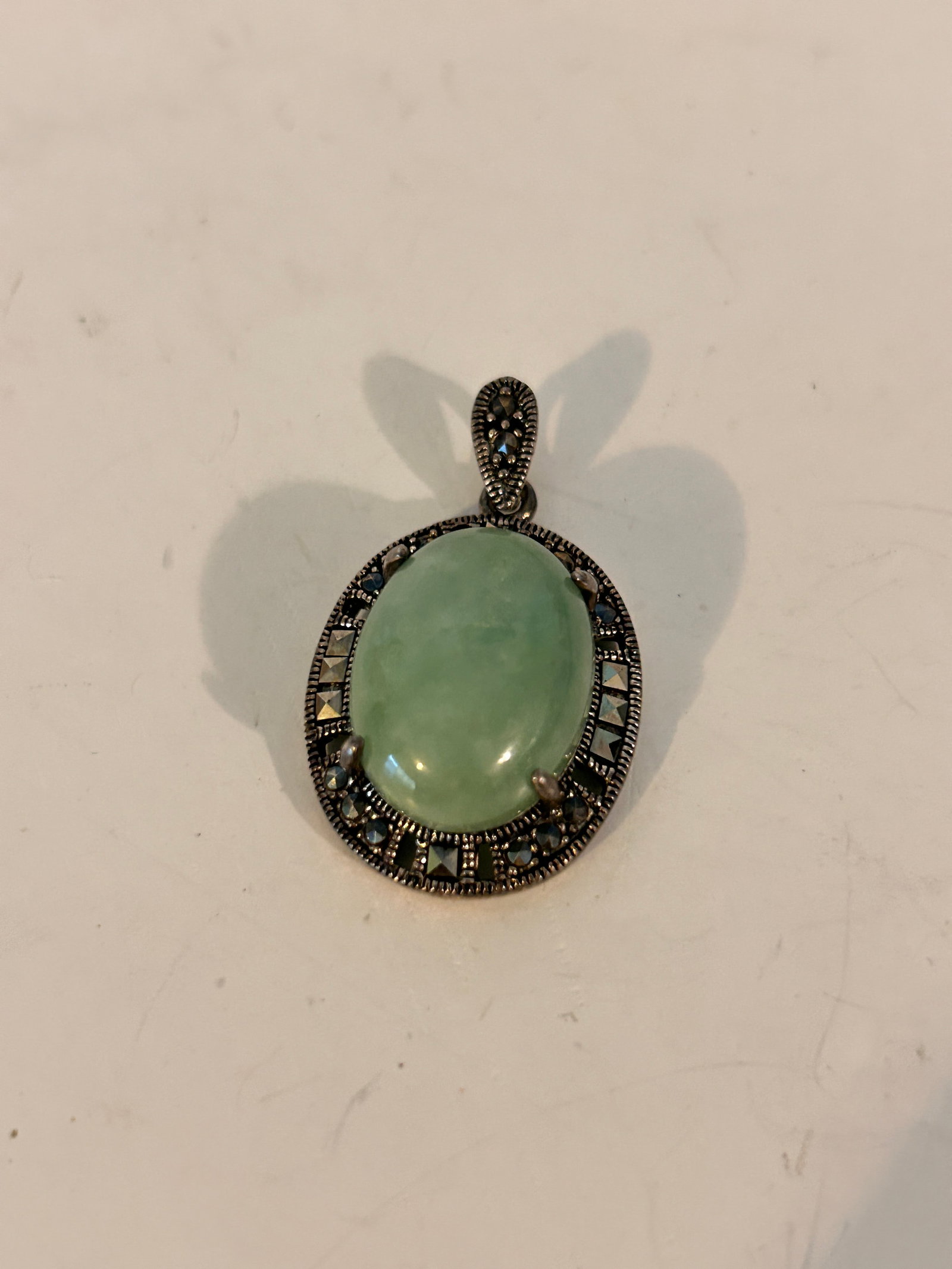 Vintage Sterling Silver marcasite & jade cabochon Pendant: Vintage Sterling Silver marcasite & jade cabochon Pendant Please view all photos as they are part of the description and condition of this Item, Feel free to contact me with questions or picture reque