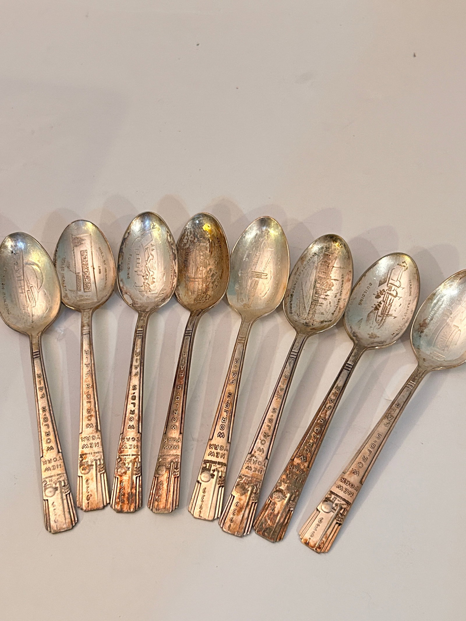 Lot of 8 Spoons 1939 New York World's Fair H Rogers Co silver-plate: Lot of 8 Spoons 1939 New York World's Fair H Rogers Co silver-plate Please view all photos as they are part of the description and condition of this Item, Feel free to contact me with questions or pic