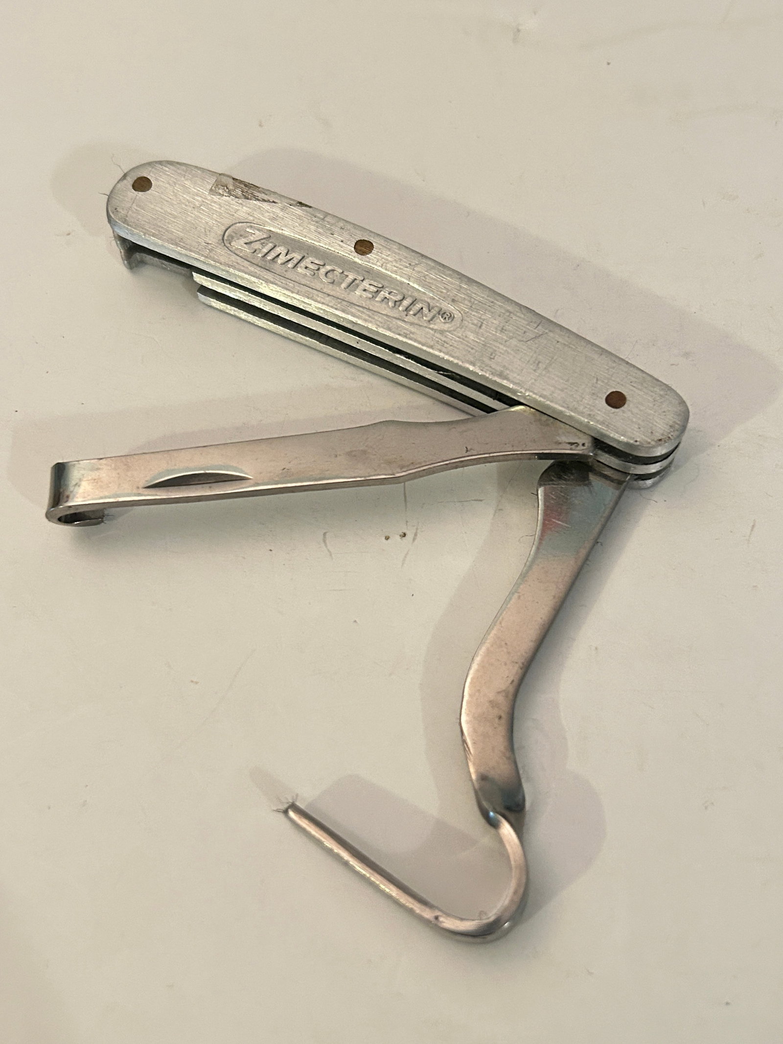 ZIMECTERIN branded tool is a multi-function pocket knife: ZIMECTERIN branded tool is a multi-function pocket knife Please view all photos as they are part of the description and condition of this Item, Feel free to contact me with questions or picture reques