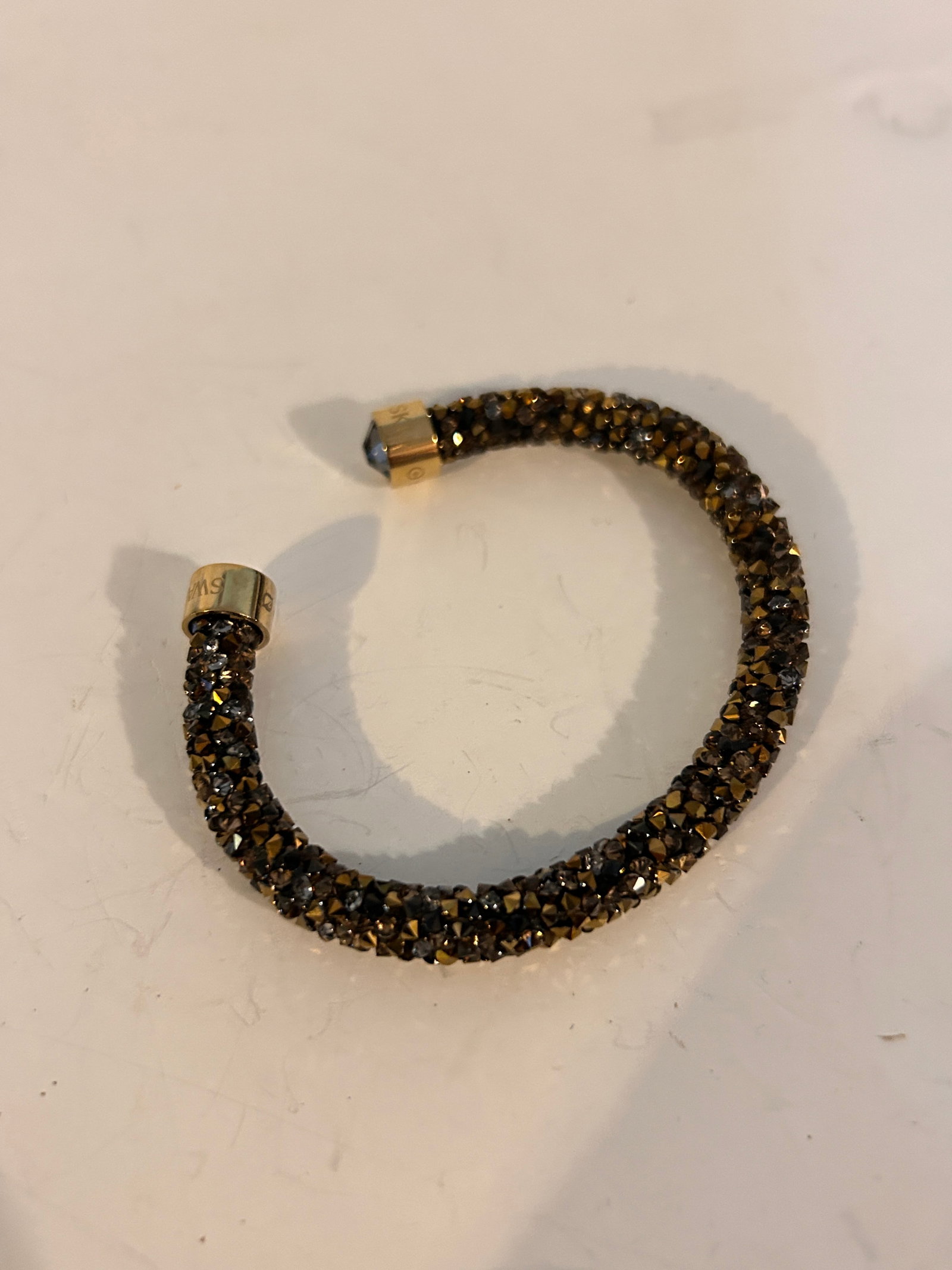 Swarovski Crystal Crystaldust S Bangle Bracelet 7": Swarovski Crystal Crystaldust S Bangle Bracelet 7" Please view all photos as they are part of the description and condition of this Item, Feel free to contact me with questions or picture requests! Us