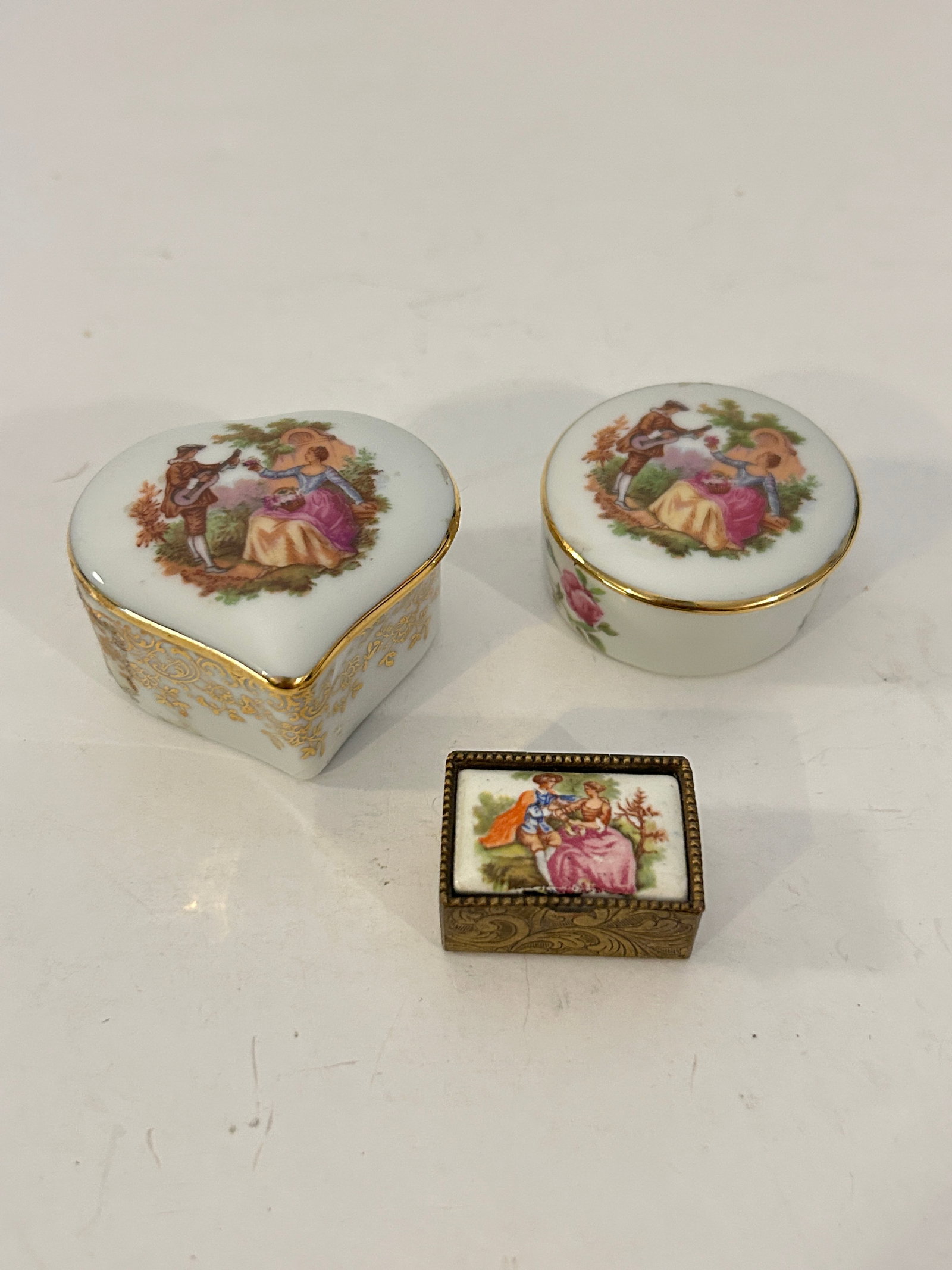 3 Antique Porcelain trinkits: 3 Antique Porcelain trinkits Please view all photos as they are part of the description and condition of this Item, Feel free to contact me with questions or picture requests! Used Item AS IS