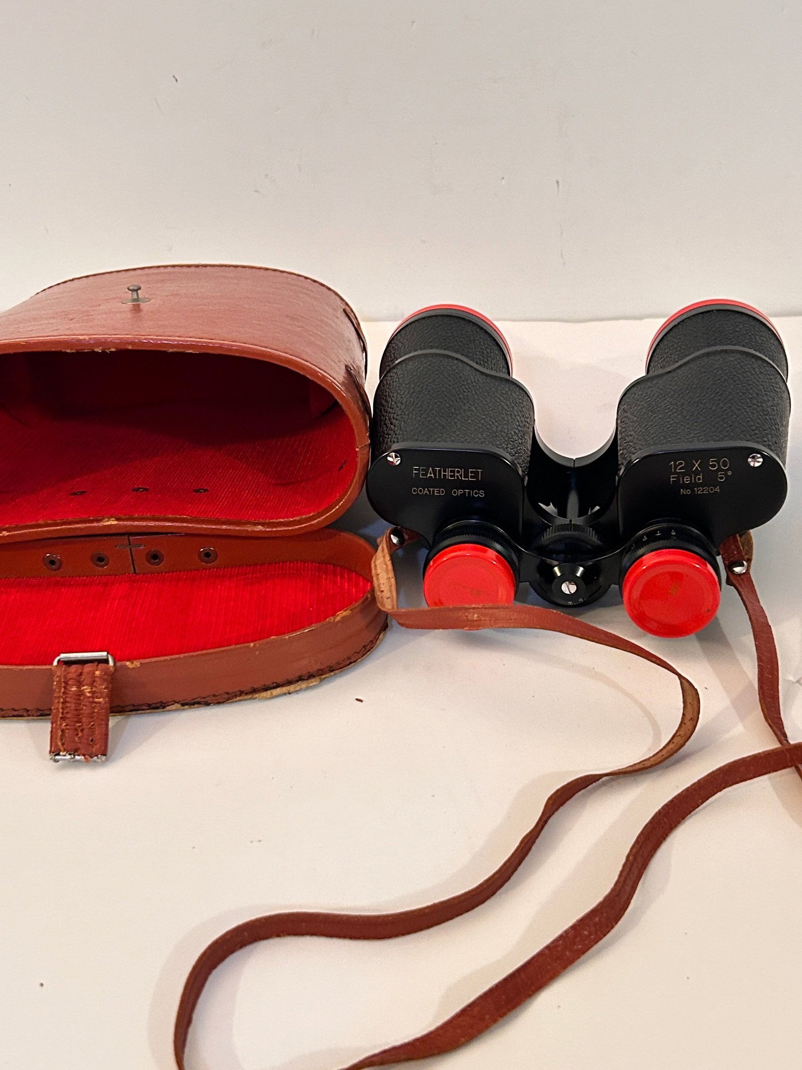 Vintage Featherlet binoculars with leather case 12X50