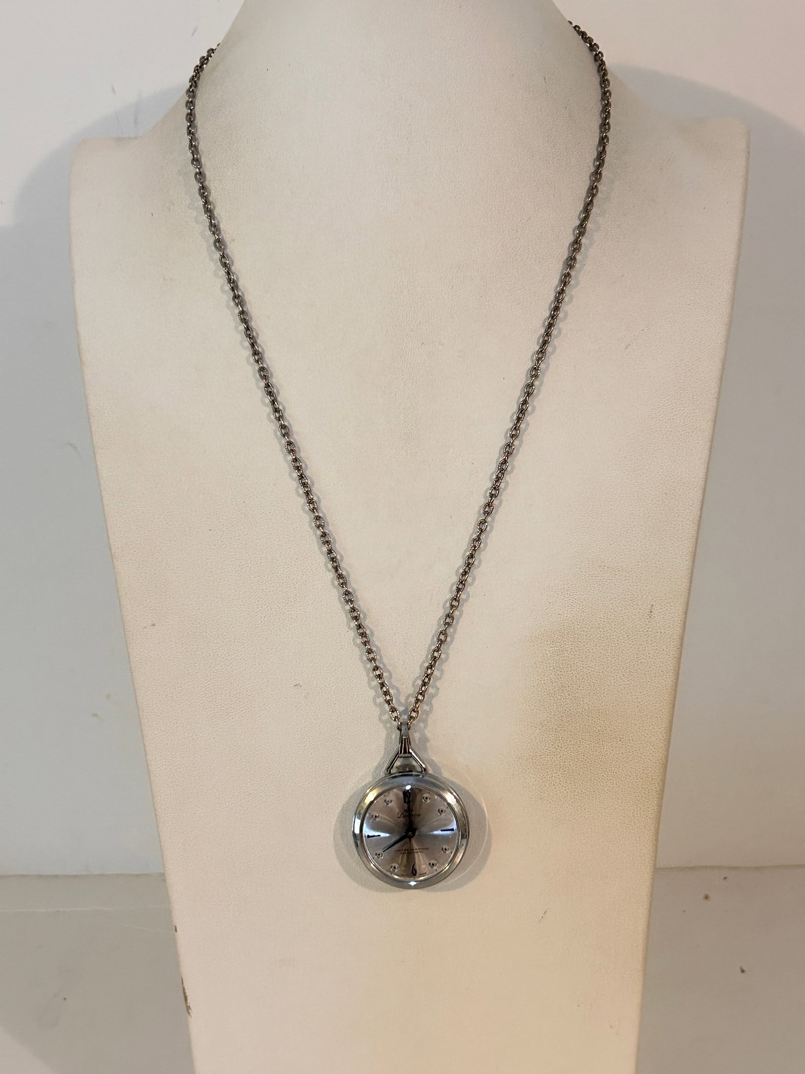 vintage Lucerne Swiss pendant watch features a silver-tone finish mech not working