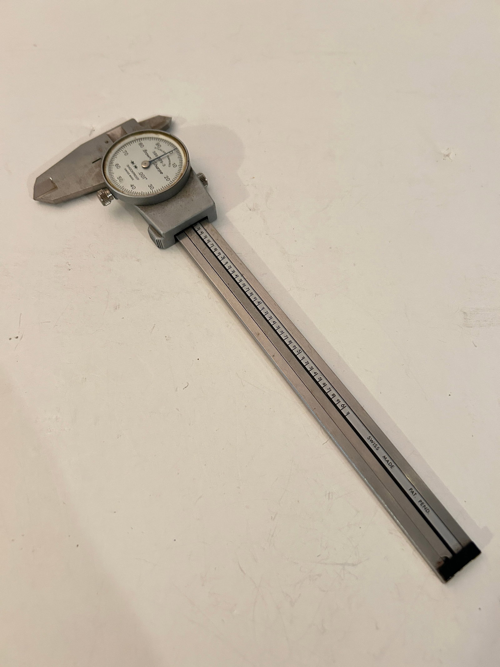 Brown & Sharpe 599-579-3 Swiss Made Dial Caliper: Brown & Sharpe 599-579-3 Swiss Made Dial Caliper Please view all photos as they are part of the description and condition of this Item, Feel free to contact me with questions or picture requests! Used