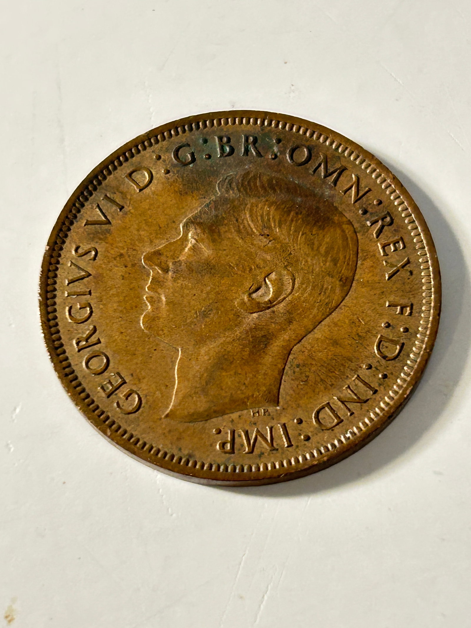Vintage British bronze penny featuring King George VI: Vintage British bronze penny featuring King George VI