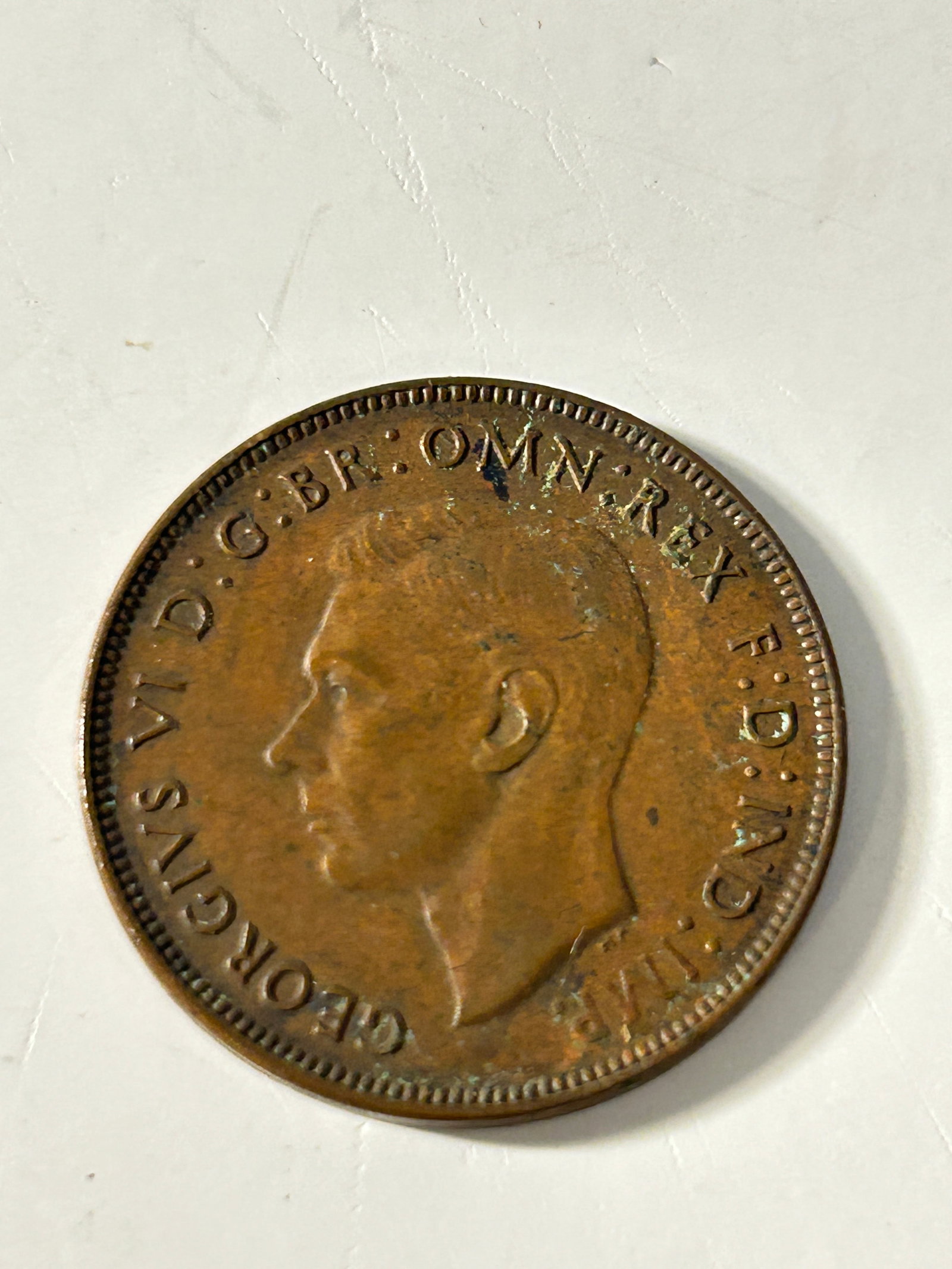 Vintage 1941 British bronze penny featuring the portrait of King George VI (1 of 2)