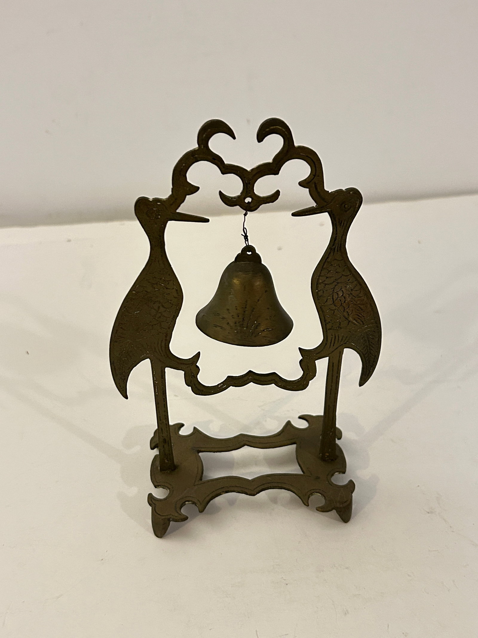Vintage Chinese Brass Bell featuring a stand with two birds: Vintage Chinese Brass Bell featuring a stand with two birds Please view all photos as they are part of the description and condition of this Item, Feel free to contact me with questions or picture req