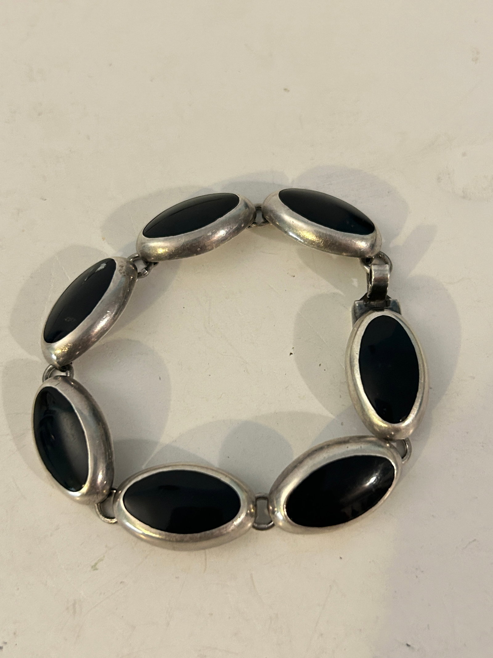 Vintage CII Mexican sterling silver and oval black onyx cabochon link bracelet 8": Vintage CII Mexican sterling silver and oval black onyx cabochon link bracelet 8" Please view all photos as they are part of the description and condition of this Item, Feel free to contact me with qu