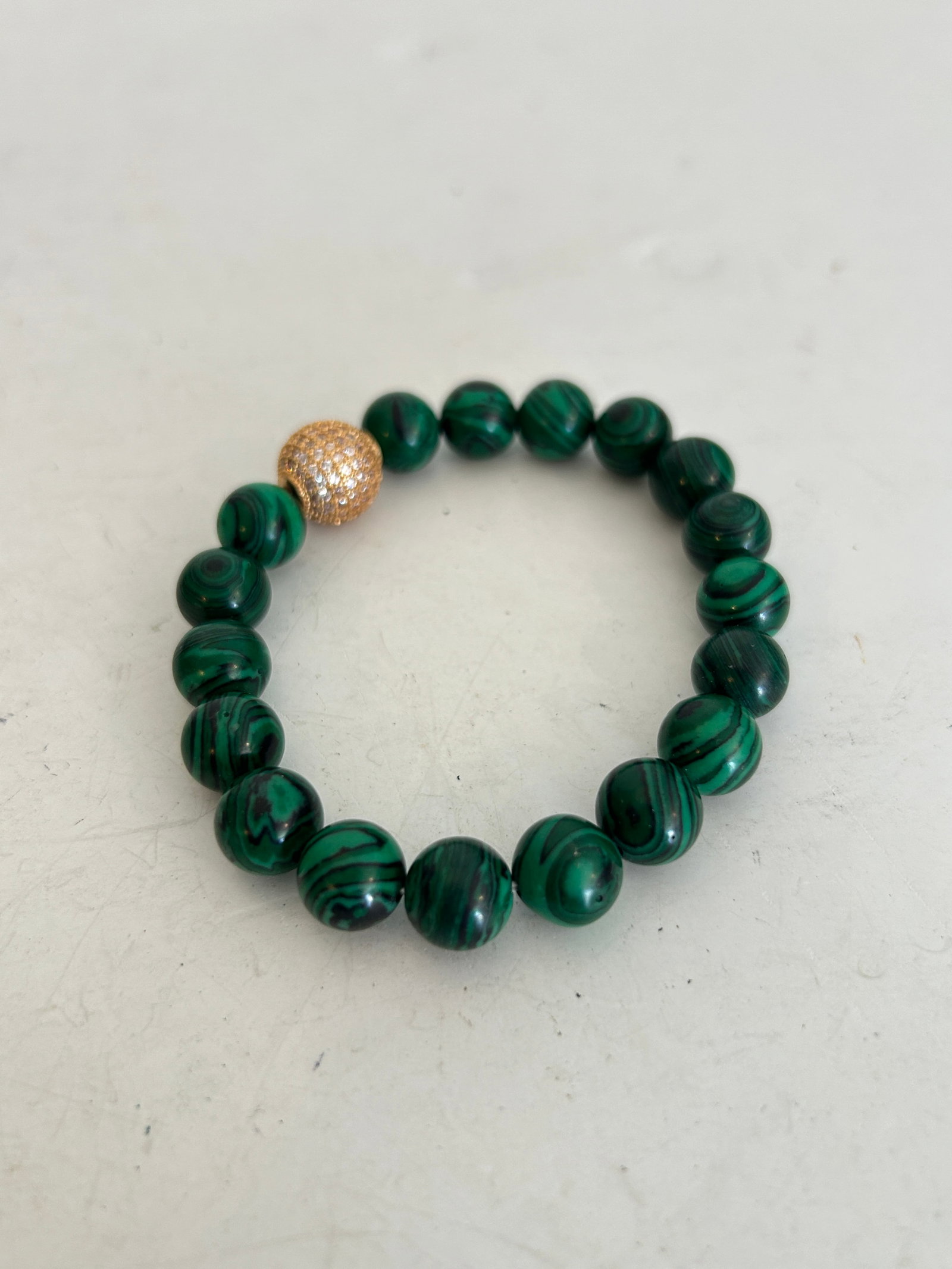 Vintage Green Malachite gold fillid stretch Bracelet: Vintage Green Malachite gold fillid stretch Bracelet Please view all photos as they are part of the description and condition of this Item, Feel free to contact me with questions or picture requests! 