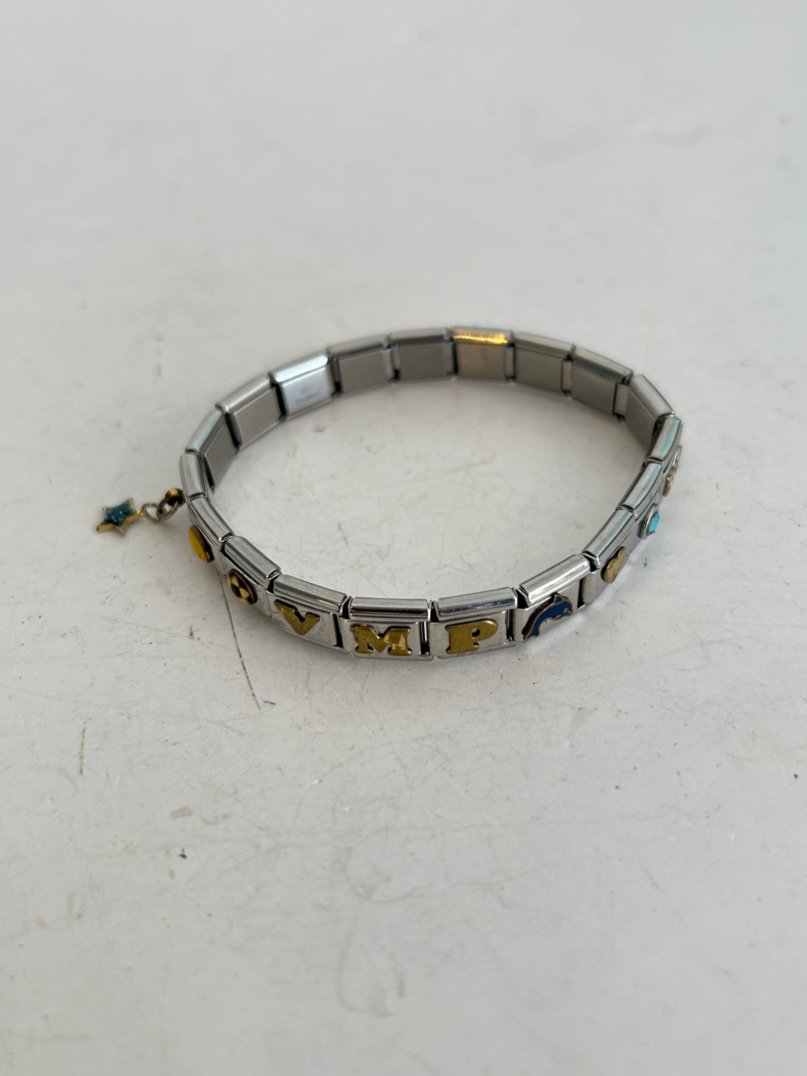 Vintage modular Italian charm Stretch Bracelet: Vintage modular Italian charm Stretch Bracelet Please view all photos as they are part of the description and condition of this Item, Feel free to contact me with questions or picture requests! Used I