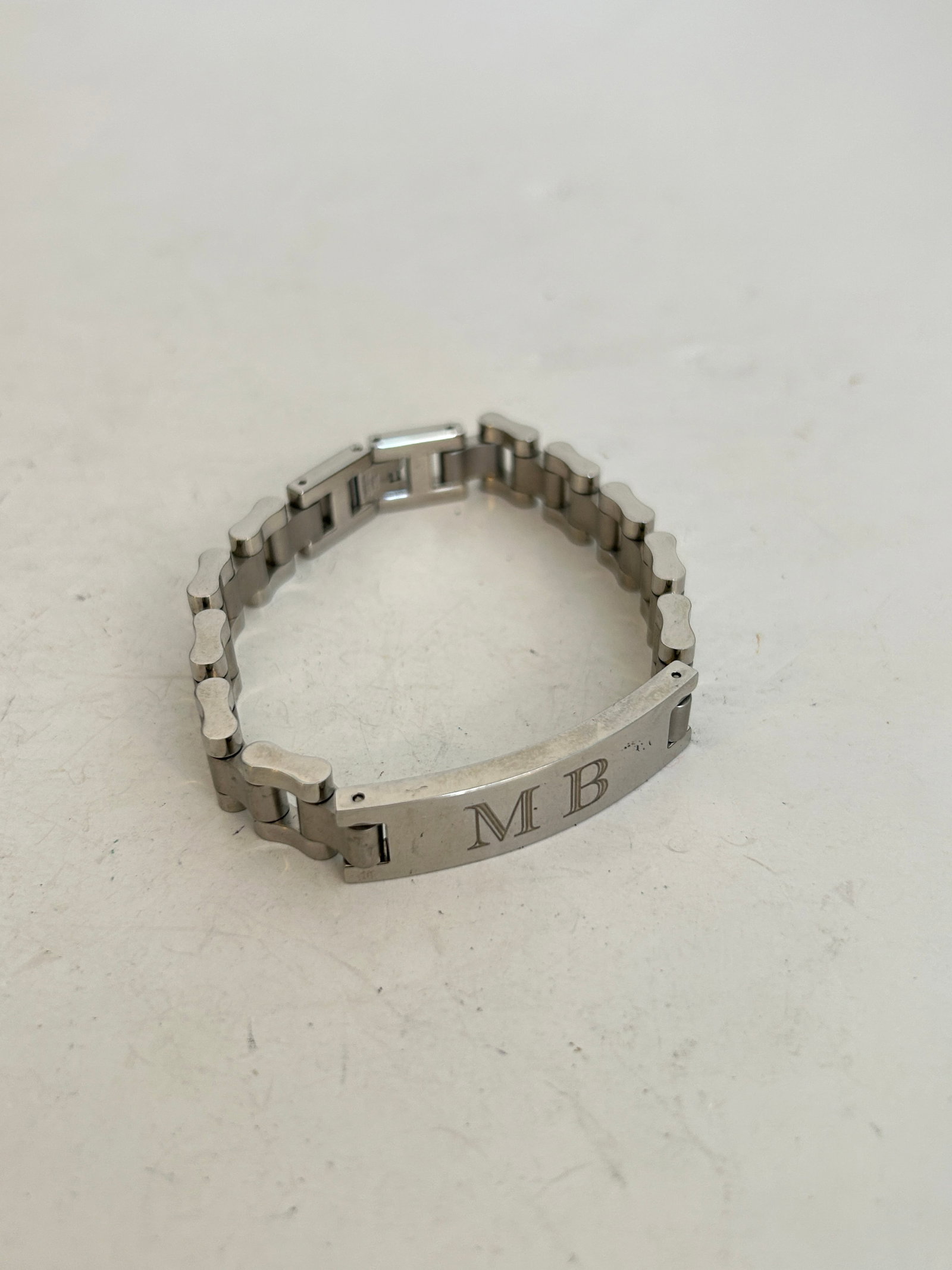 Vintage MB Personalized Stainless Bracelet 8": Vintage MB Personalized Stainless Bracelet 8" Please view all photos as they are part of the description and condition of this Item, Feel free to contact me with questions or picture requests! Used It