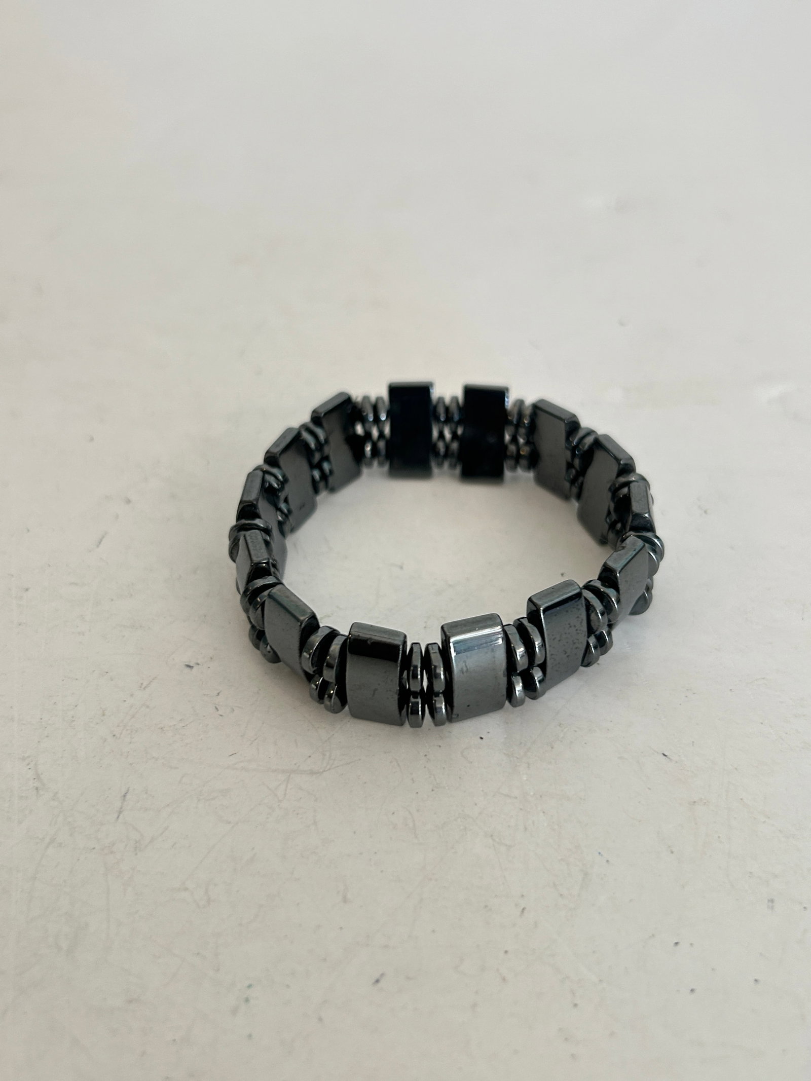 Vintage Magnetic Hematite Stretch Bracelet: Vintage Magnetic Hematite Stretch Bracelet Please view all photos as they are part of the description and condition of this Item, Feel free to contact me with questions or picture requests! Used Item 