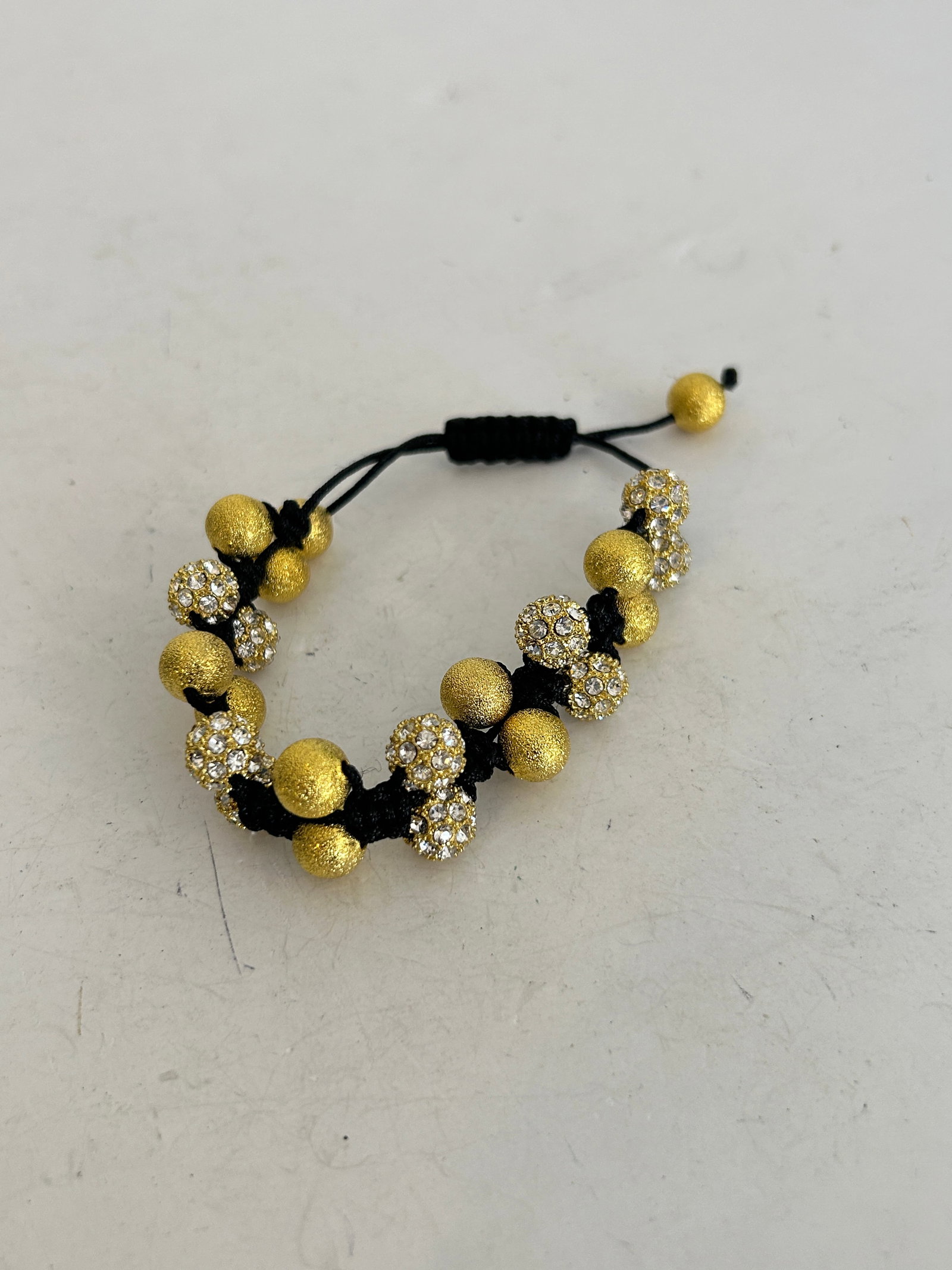 Vintage Adjustable Macrame Bracelet Gold Tone Crystal Beads: Vintage Adjustable Macrame Bracelet Gold Tone Crystal Beads Please view all photos as they are part of the description and condition of this Item, Feel free to contact me with questions or picture req