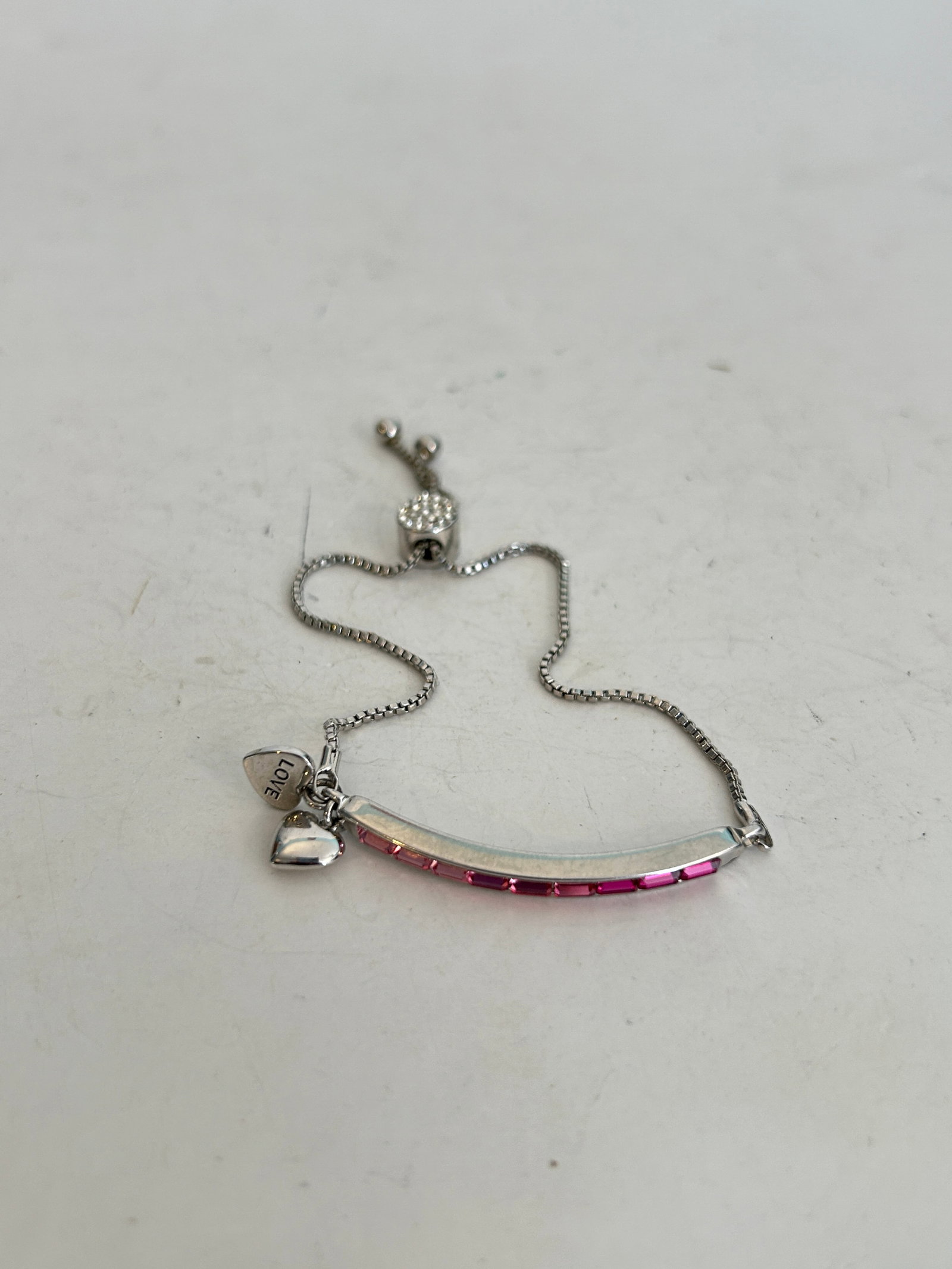 Vintage silver-tone red rhinestone adjustable slider tennis Bracelet: Vintage silver-tone red rhinestone adjustable slider tennis Bracelet Please view all photos as they are part of the description and condition of this Item, Feel free to contact me with questions or pi