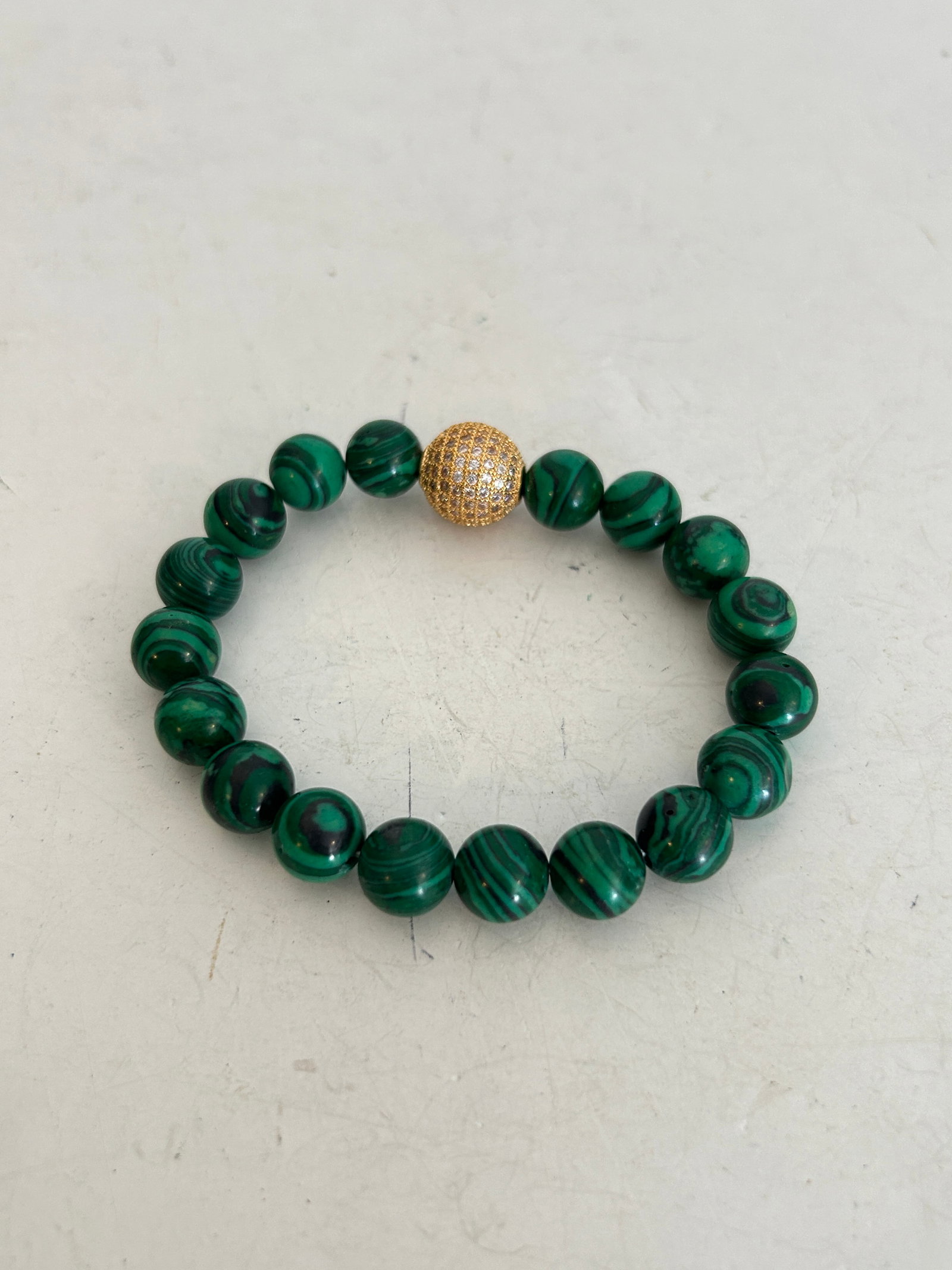 Vintage Green Malachite gold fillid stretch Bracelet: Vintage Green Malachite gold fillid stretch Bracelet Please view all photos as they are part of the description and condition of this Item, Feel free to contact me with questions or picture requests! 