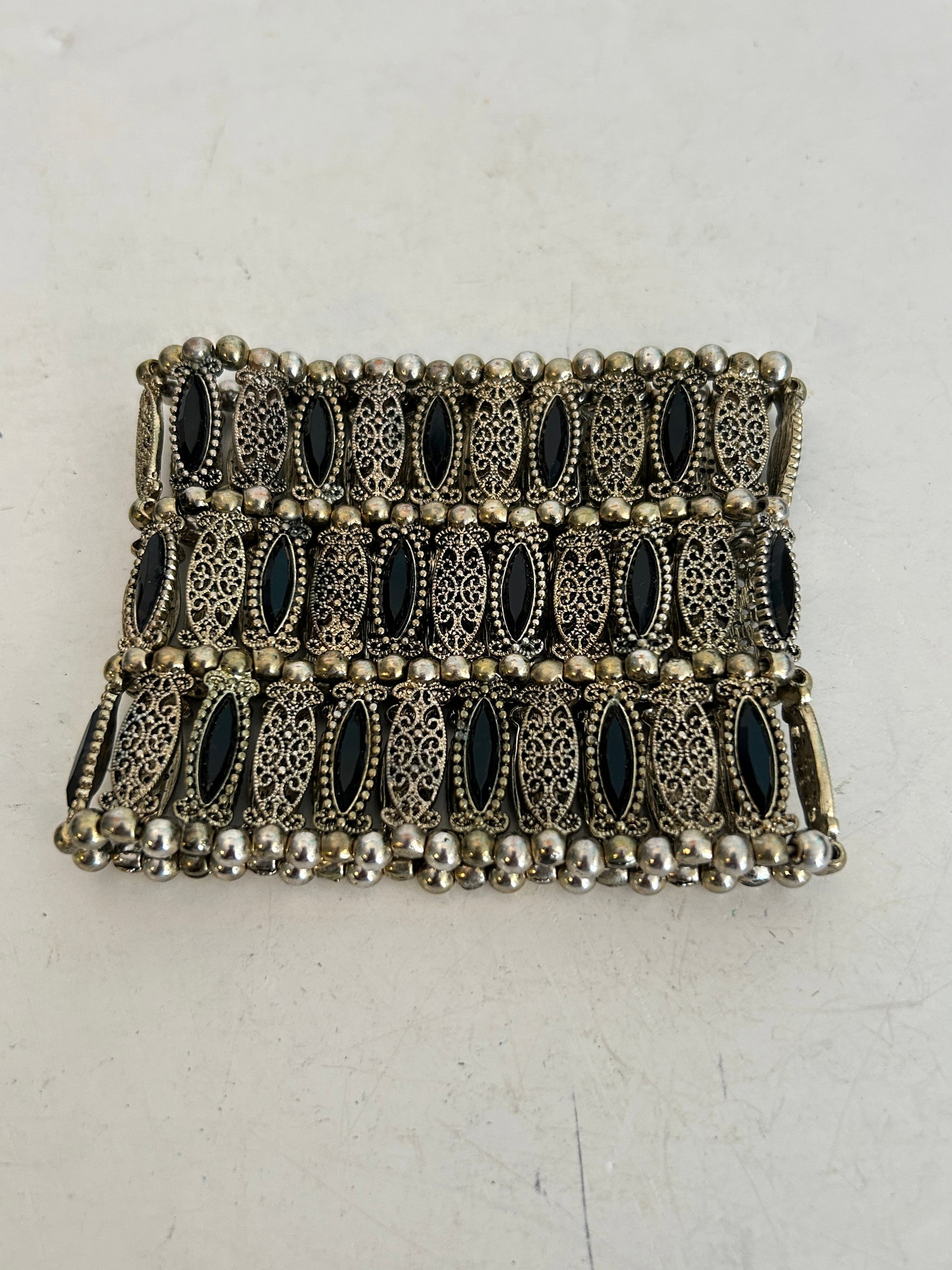 Vintage antique-style filigree panel stretch cuff Bracelet: Vintage antique-style filigree panel stretch cuff Bracelet Please view all photos as they are part of the description and condition of this Item, Feel free to contact me with questions or picture requ