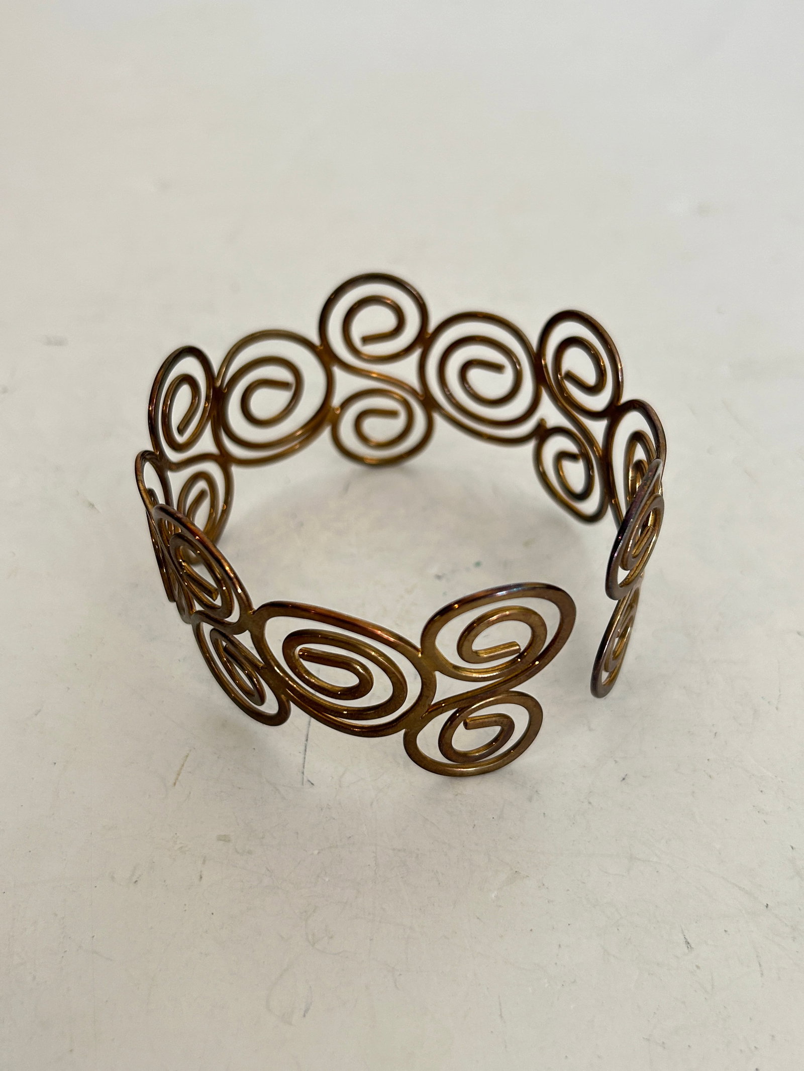 Vintage wire spiral-swirl open cuff Bracelet 9": Vintage wire spiral-swirl open cuff Bracelet 9" Please view all photos as they are part of the description and condition of this Item, Feel free to contact me with questions or picture requests! Used 