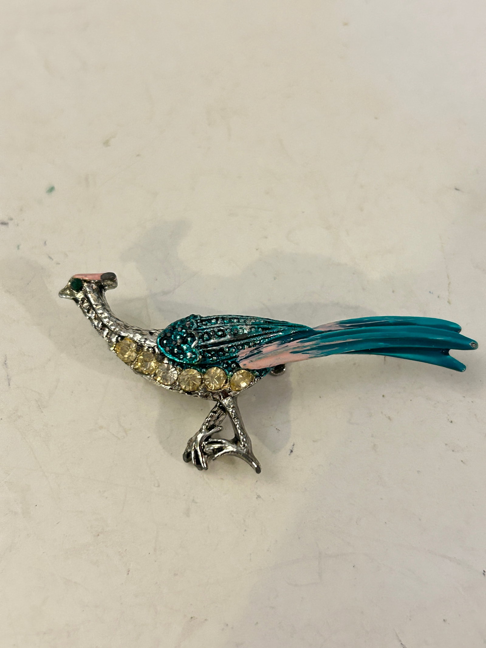 Vintage Rhinestone and Enamel Peacock or Roadrunner Brooch: Vintage Rhinestone and Enamel Peacock or Roadrunner Brooch Please view all photos as they are part of the description and condition of this Item, Feel free to contact me with questions or picture requ