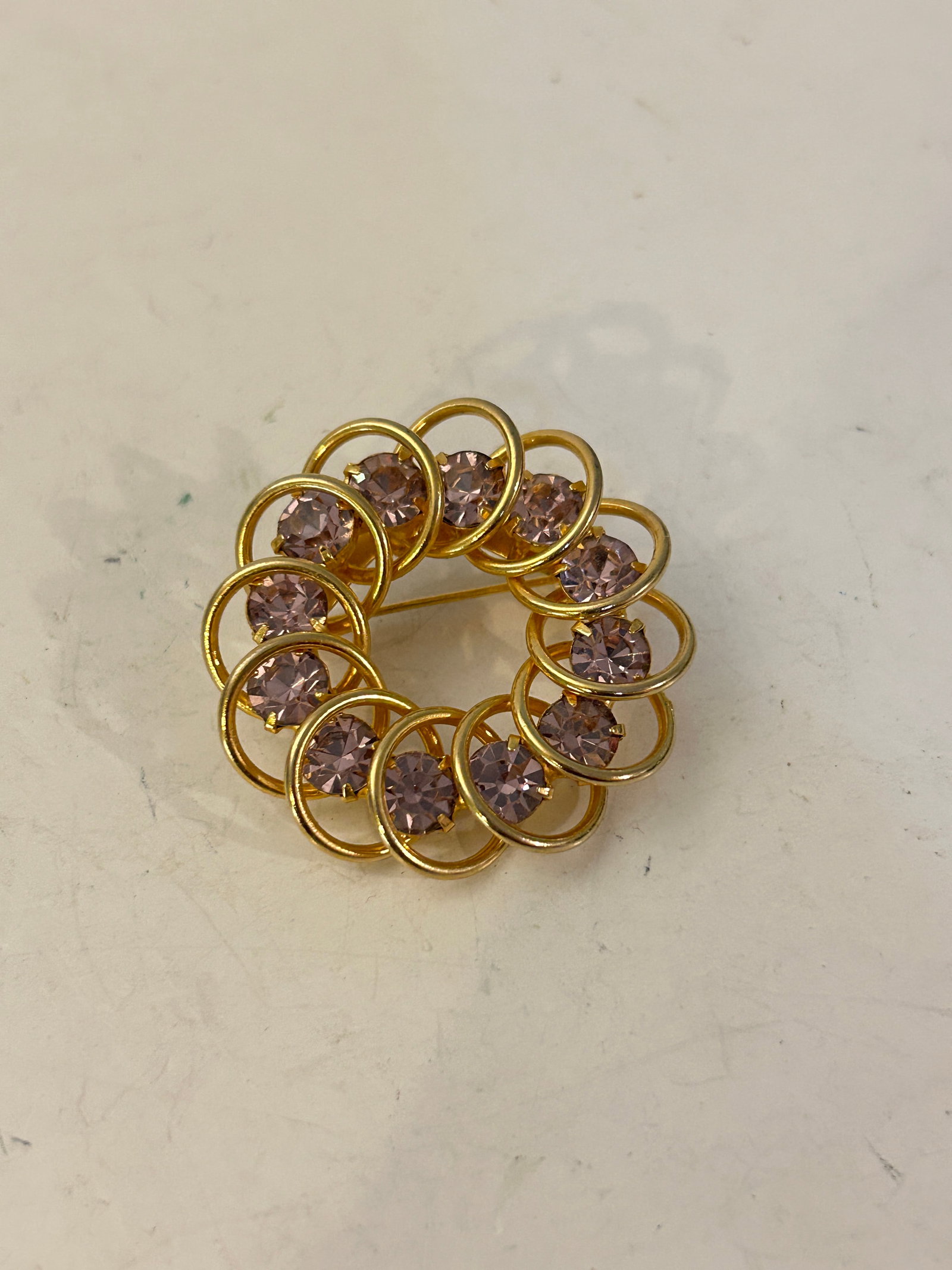 Vintage Aurora Borealis Rhinestone Circle Pin Goldtone Brooch unsigned: Vintage Aurora Borealis Rhinestone Circle Pin Goldtone Brooch unsigned Please view all photos as they are part of the description and condition of this Item, Feel free to contact me with questions or 