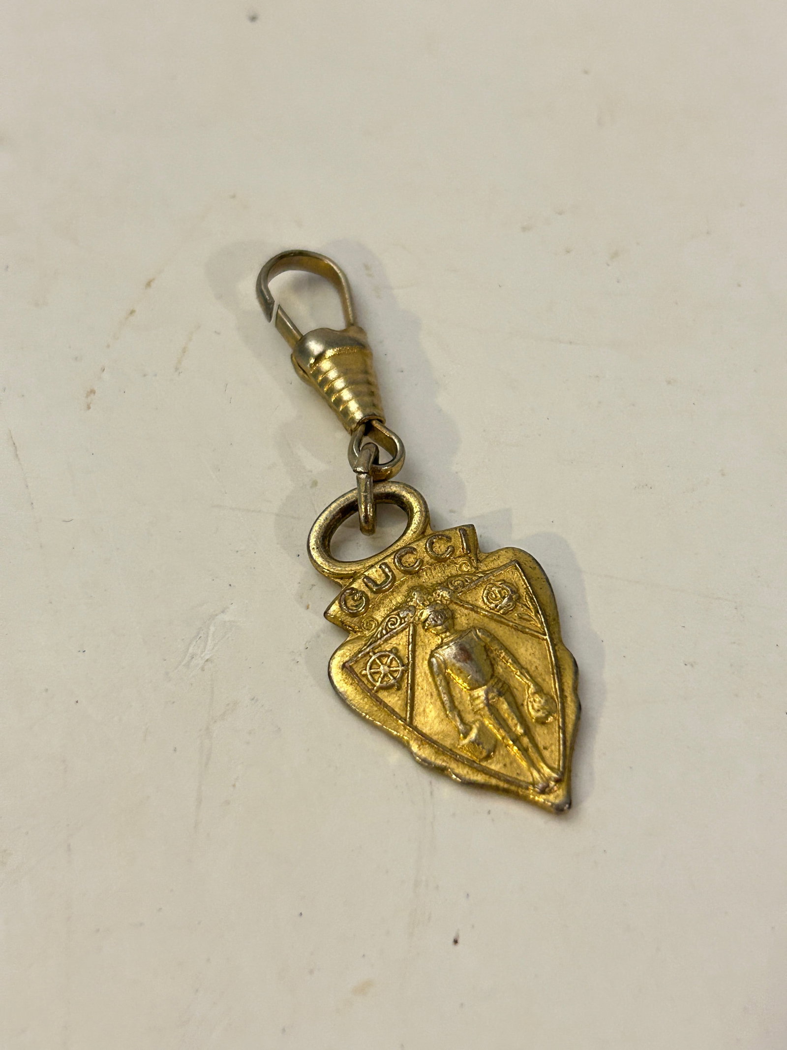 Vintage Gucci Gold Plated Knight Crest Shield Charm 1960's Pendant: Vintage Gucci Gold Plated Knight Crest Shield Charm 1960's Pendant Please view all photos as they are part of the description and condition of this Item, Feel free to contact me with questions or pict