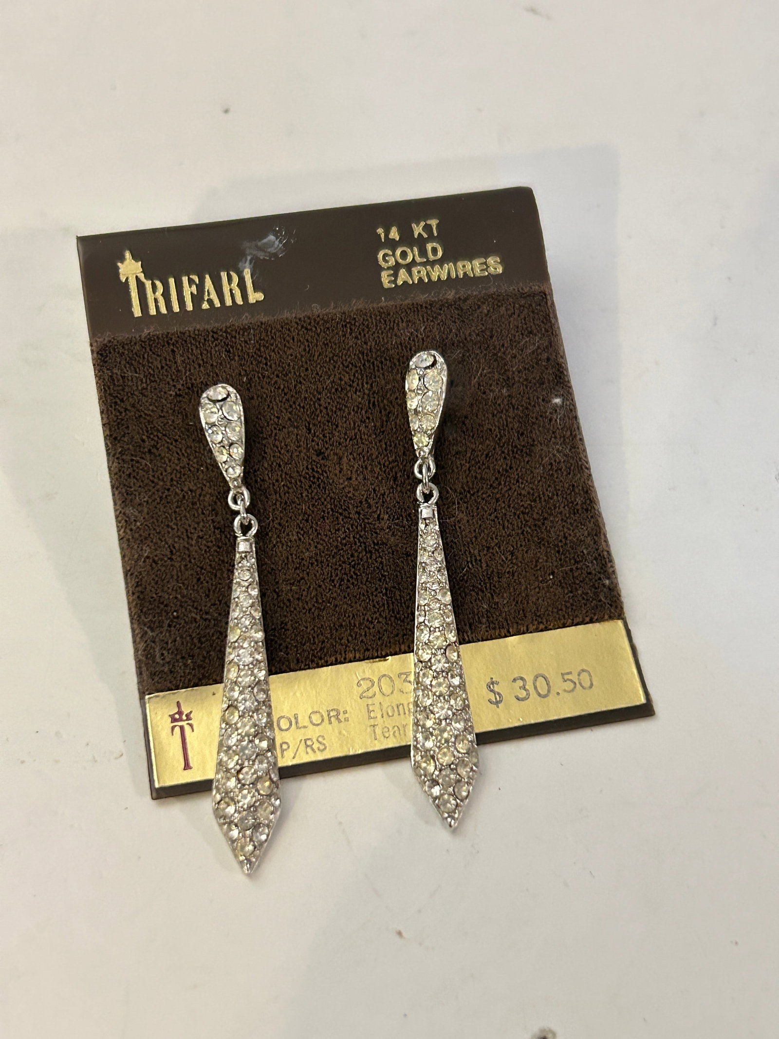 Vintage Trifari crystal pave elongated teardrop dangle Earrings: Vintage Trifari crystal pave elongated teardrop dangle Earrings Please view all photos as they are part of the description and condition of this Item, Feel free to contact me with questions or picture