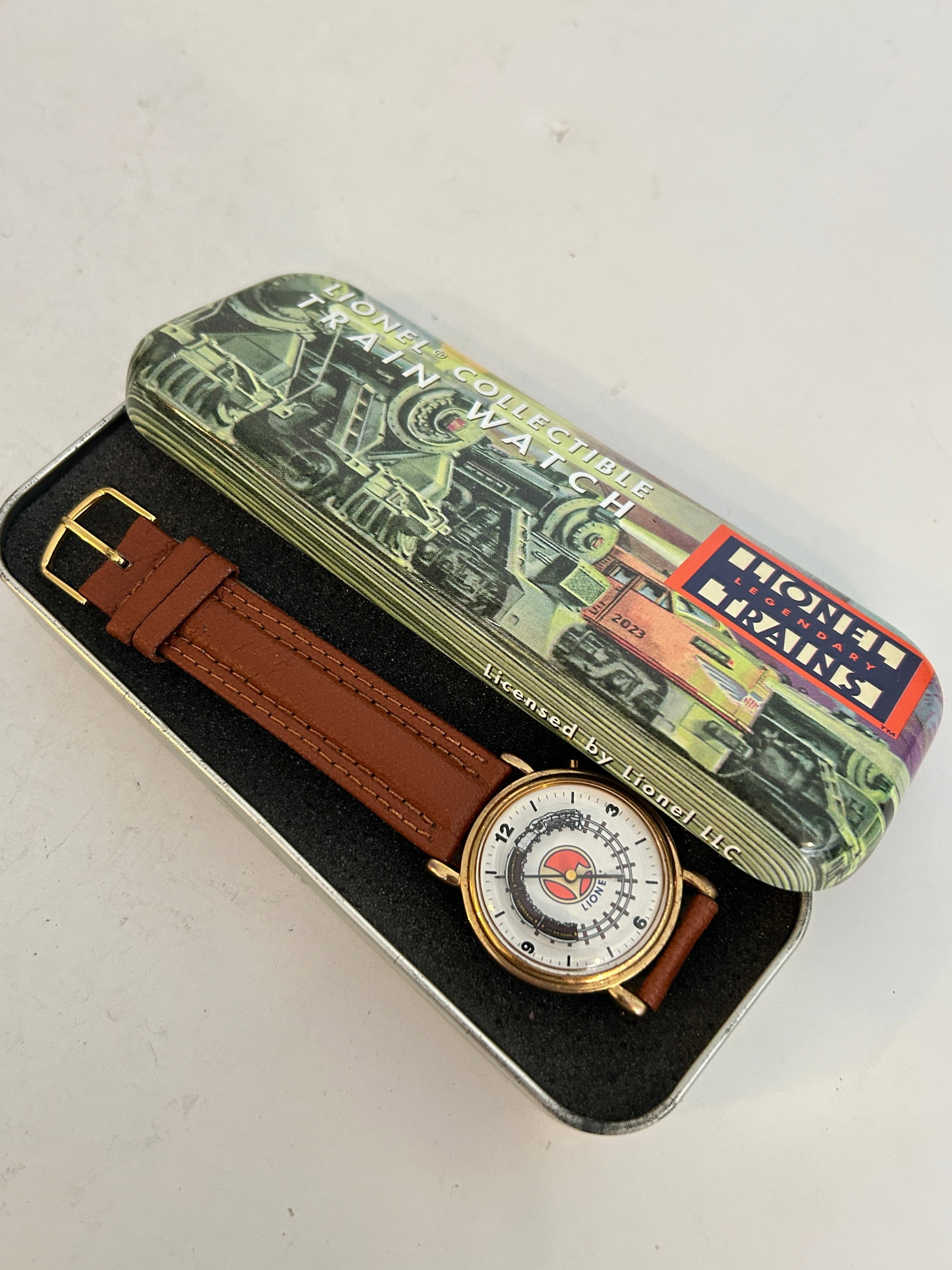Vintage Lionel Collectible Watch in Original Tin Case needs bat (1 of 6)