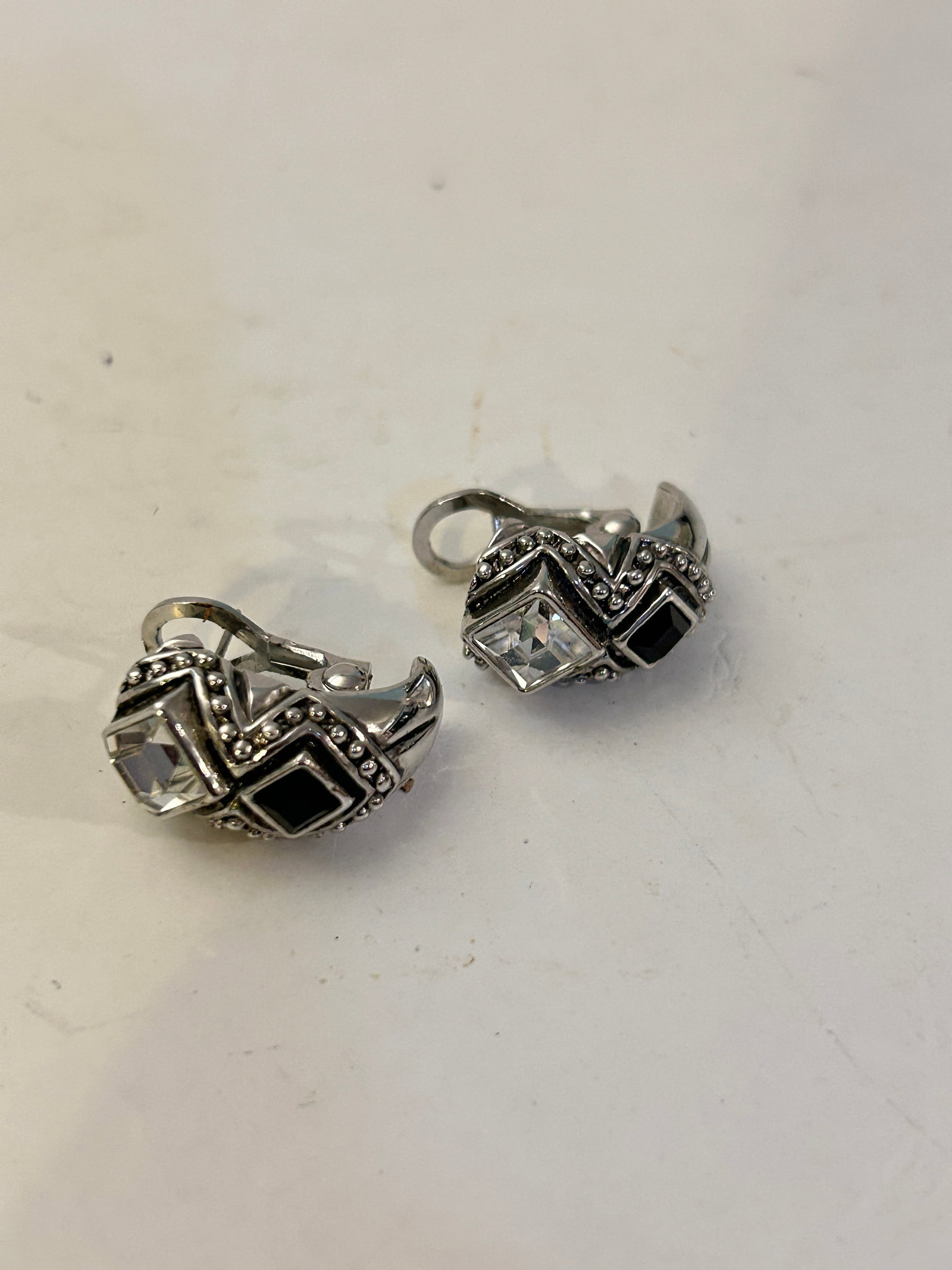 Vintage silver-tone clip-on earrings black and clear crystal accents Earrings: Vintage silver-tone clip-on earrings black and clear crystal accents Earrings Please view all photos as they are part of the description and condition of this Item, Feel free to contact me with questi