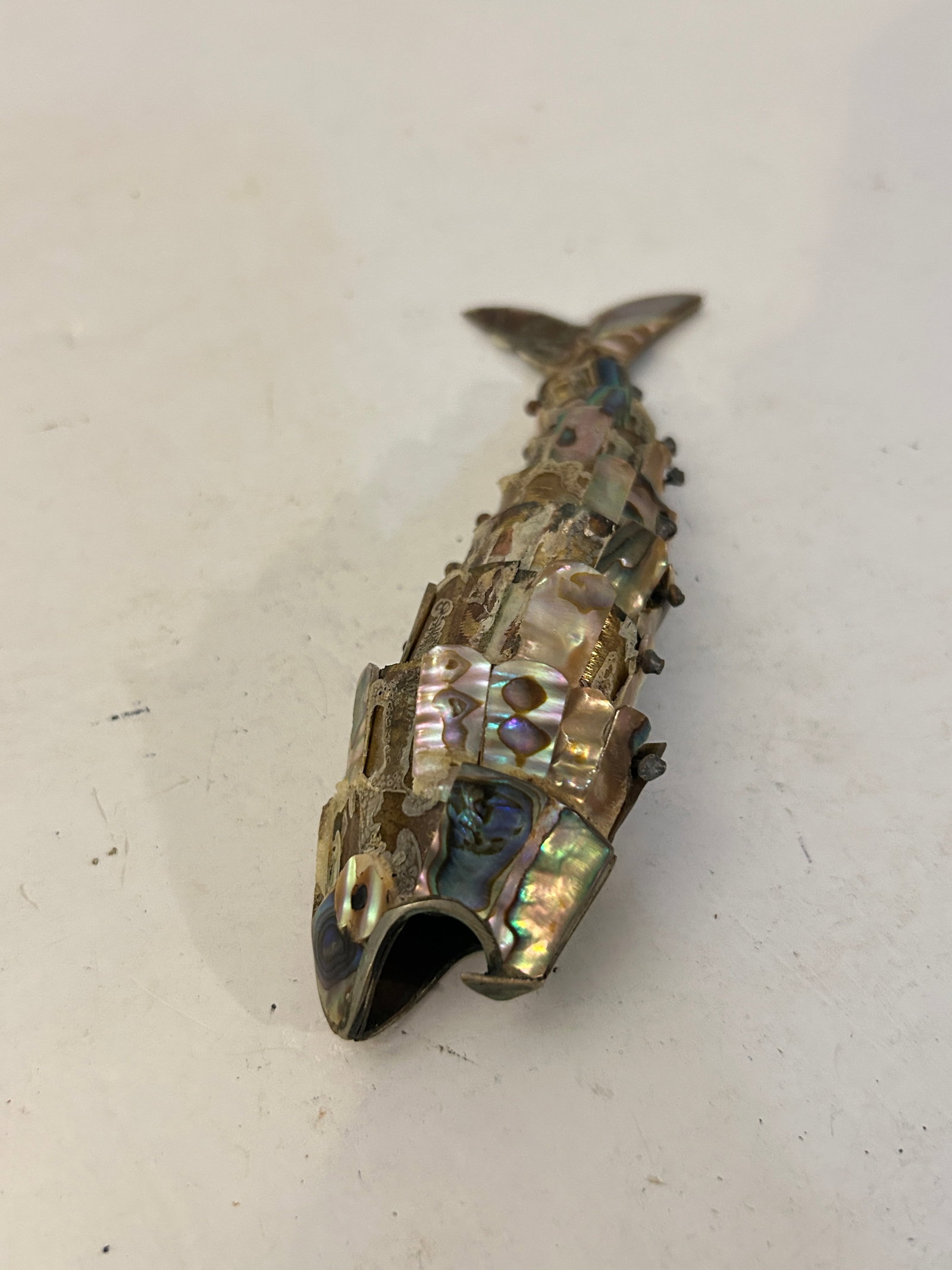 Vintage Alpaca Figural Fish Bottle Opener Inlaid Abalone MOP Mother Pearl missing pearl 6": Vintage Alpaca Figural Fish Bottle Opener Inlaid Abalone MOP Mother Pearl missing pearl 6" Please view all photos as they are part of the description and condition of this Item, Feel free to contact m