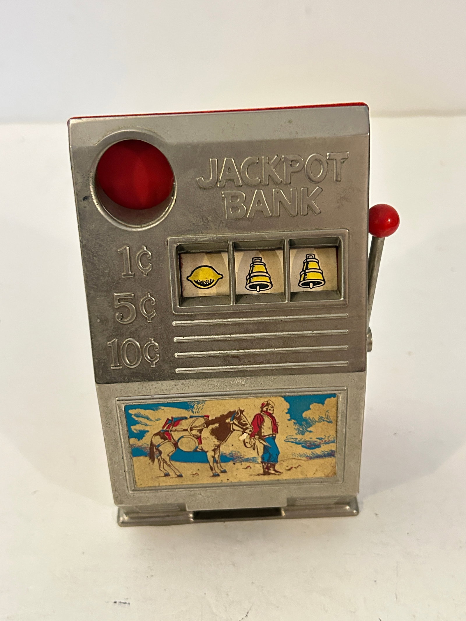 Vintage Metal Western Cowboy Mini Slot Machine Toy Gambling Bank As Is: Vintage Metal Western Cowboy Mini Slot Machine Toy Gambling Bank As Is Please view all photos as they are part of the description and condition of this Item, Feel free to contact me with questions or 