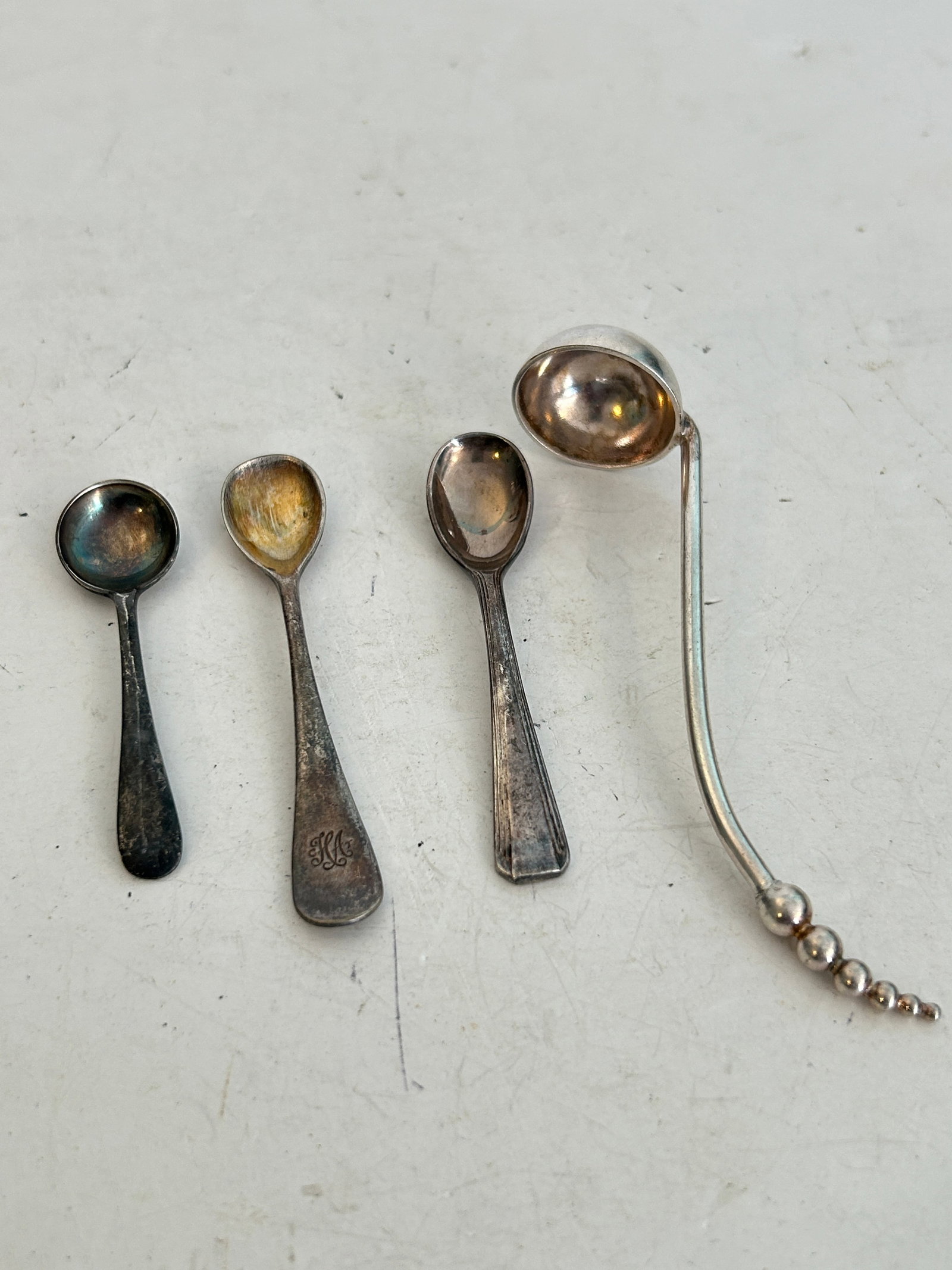 3 Miniature Salt or Mustard Spoons 1 mini ladle spoon: 3 Miniature Salt or Mustard Spoons 1 mini ladle spoon Please view all photos as they are part of the description and condition of this Item, Feel free to contact me with questions or picture requests!