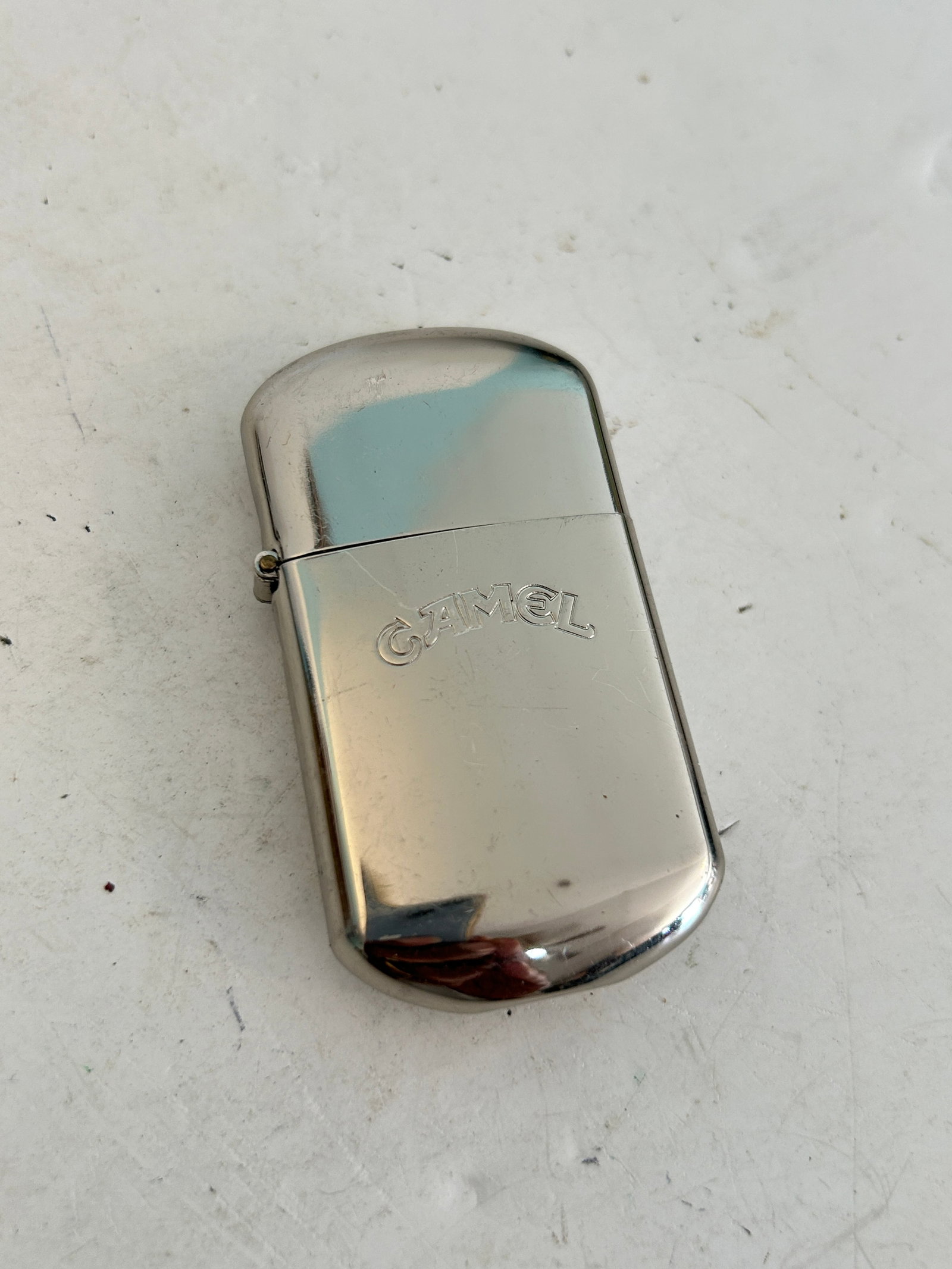 Vintage Camel Cigarette Advertising Chrome Lighter: Vintage Camel Cigarette Advertising Chrome Lighter Please view all photos as they are part of the description and condition of this Item, Feel free to contact me with questions or picture requests! Us