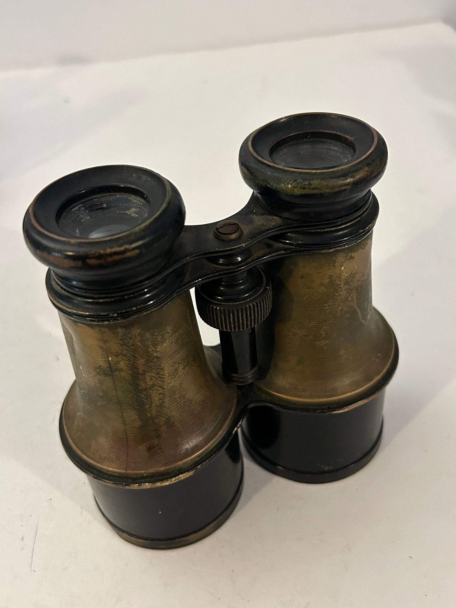 vintage pair of brass field glasses circa late 1800s to World War I era: vintage pair of brass field glasses circa late 1800s to World War I era Please view all photos as they are part of the description and condition of this Item, Feel free to contact me with questions or